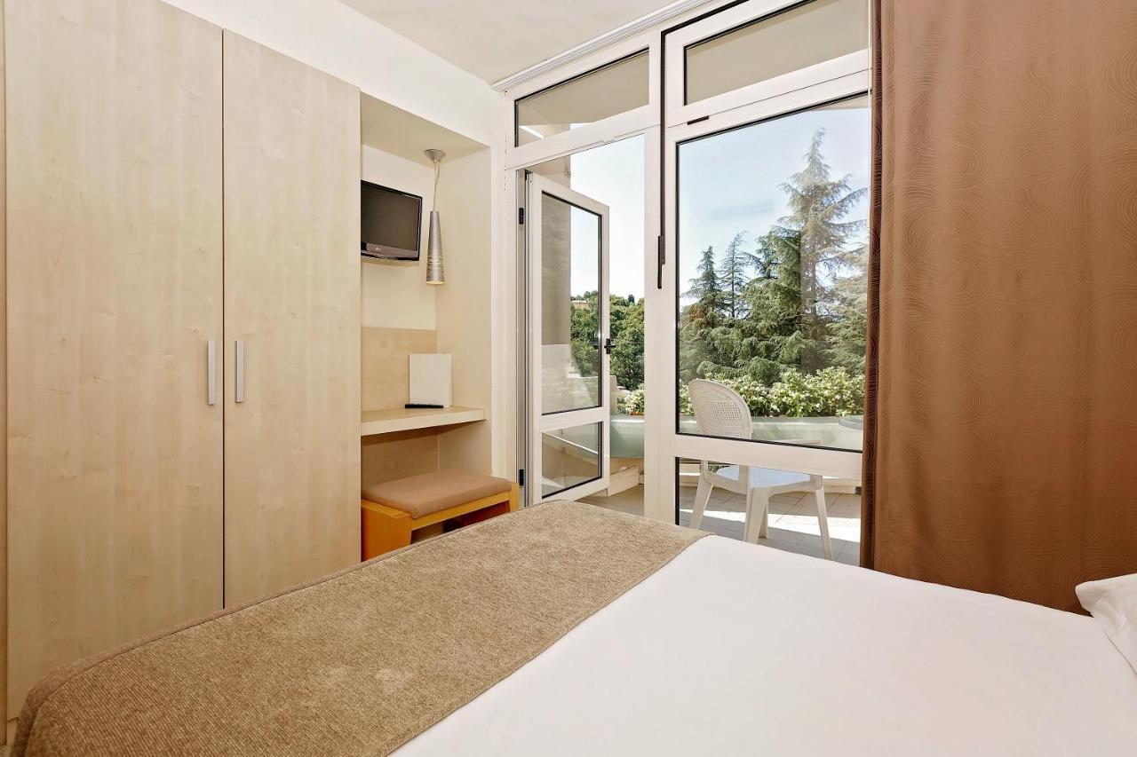 Habitación Individual Clásica con balcón - Lado parque