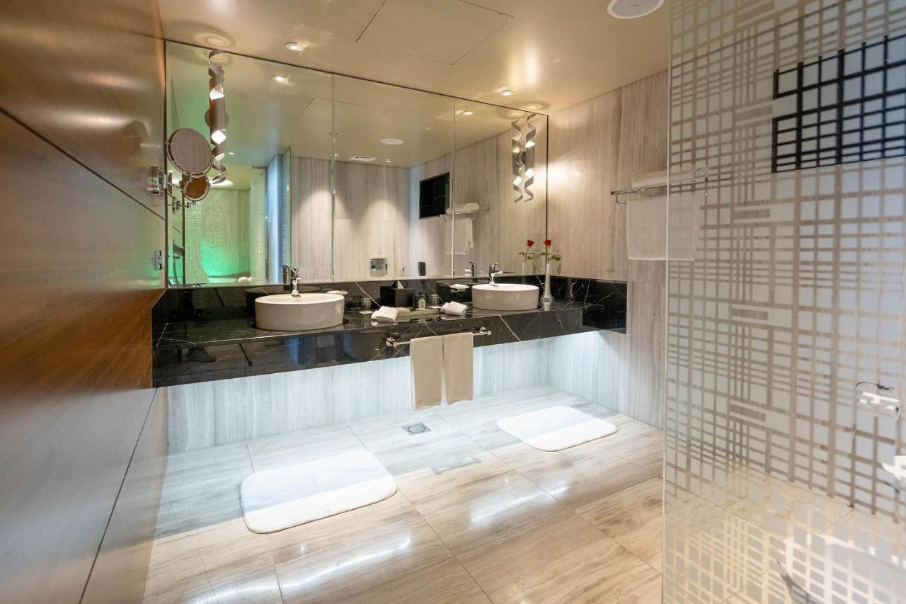 Amwaj Suite Sea view rooms, complimentary access to private beach, 3 temperature-controlled pools, Olympic swimming pool, kids' club, and kids' park