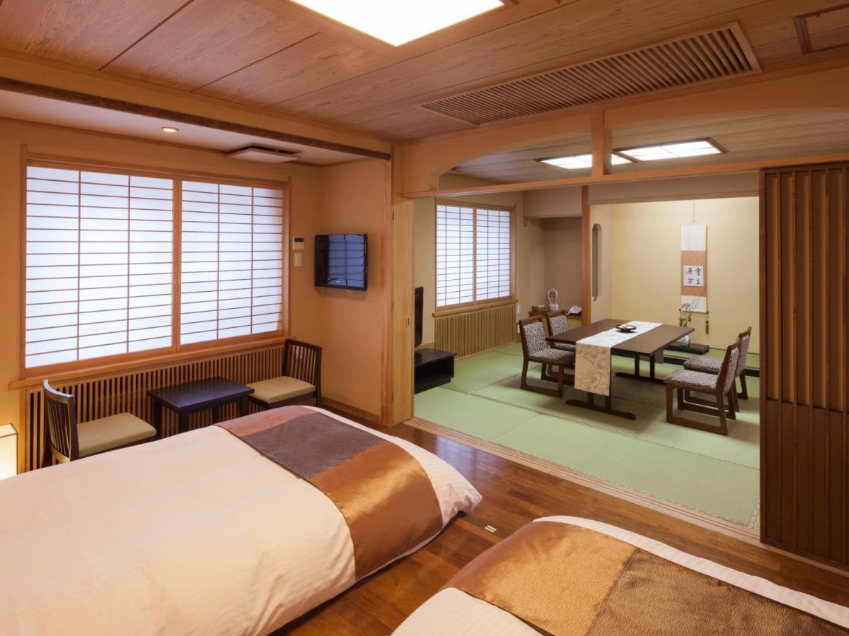 Camera Familiare con Vista Giardino