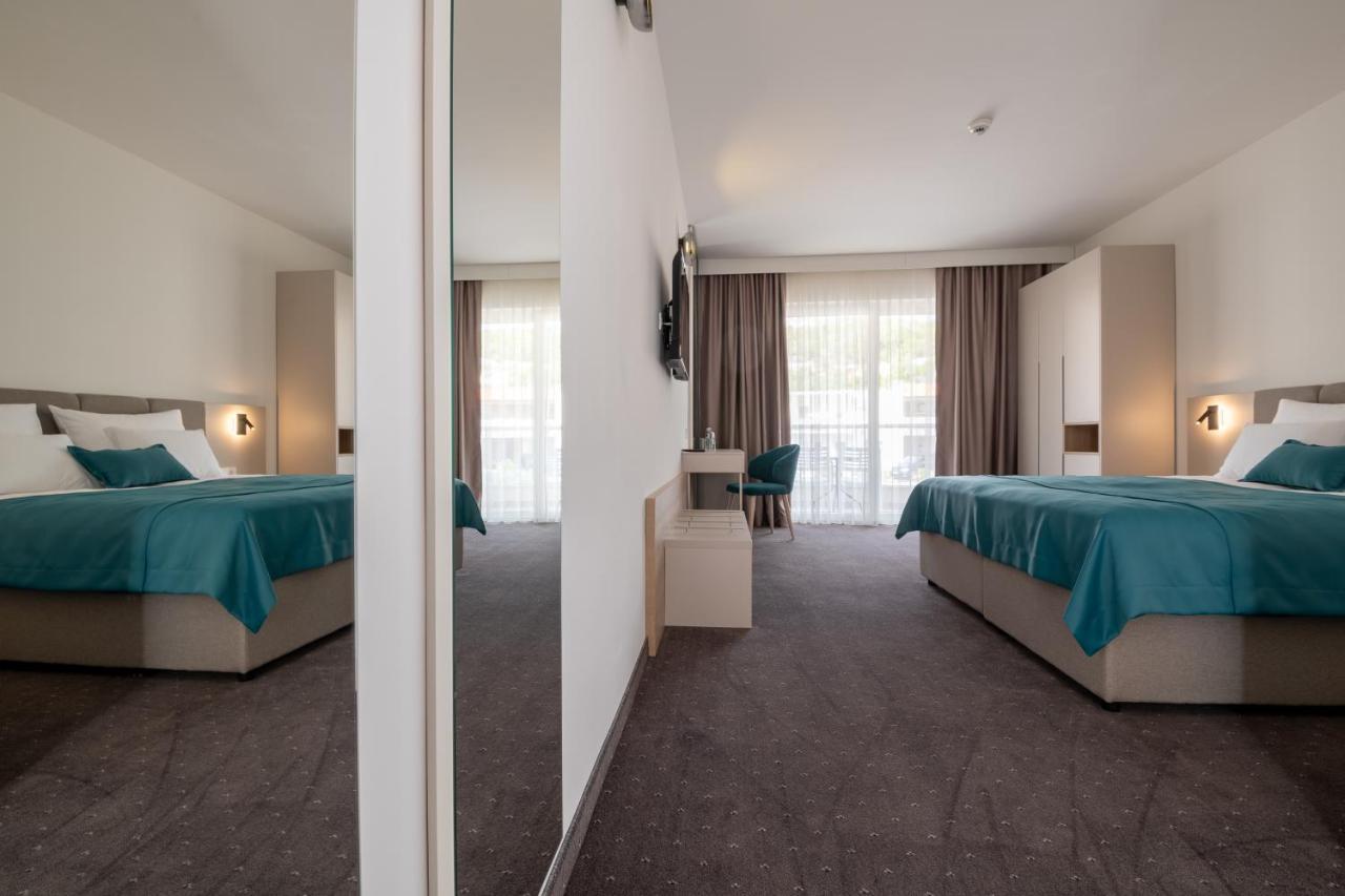 Standaard Tweepersoonskamer met 1 of 2 Bedden en Balkon