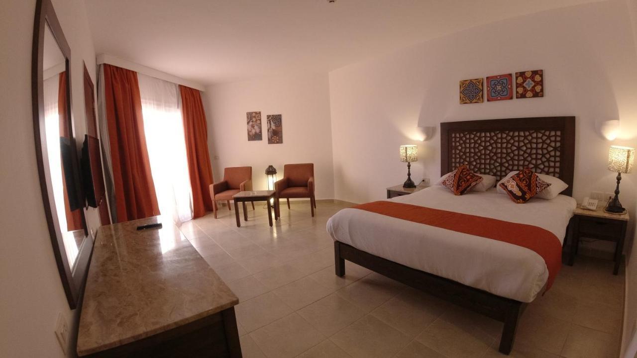 Habitación Doble Deluxe con vistas laterales al mar
