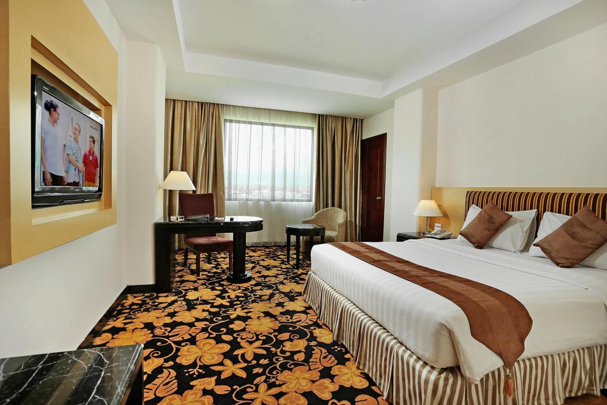 Alojamiento Grand Deluxe - 1 cama extragrande