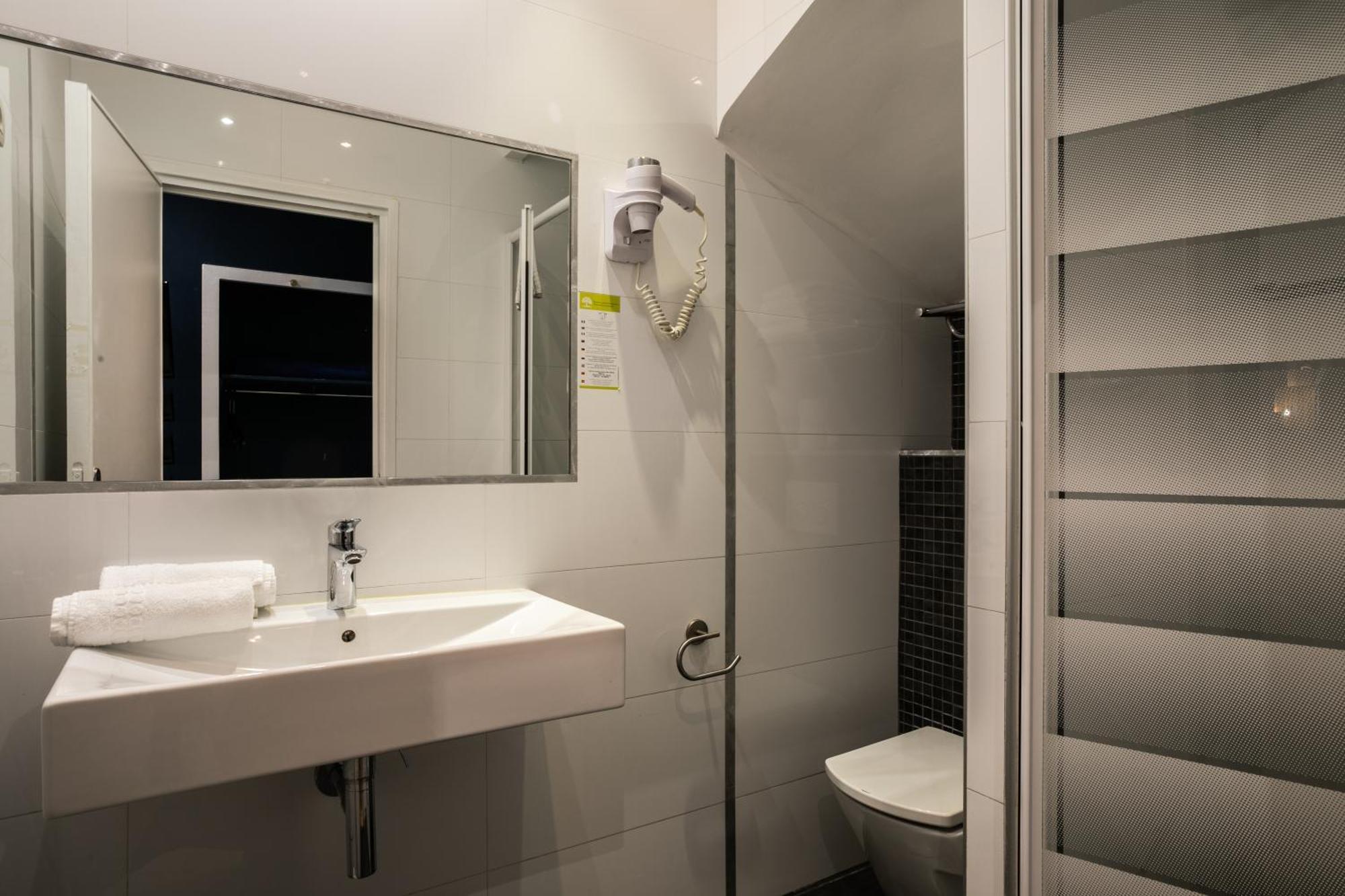 Tweepersoonskamer met 2 Aparte Bedden