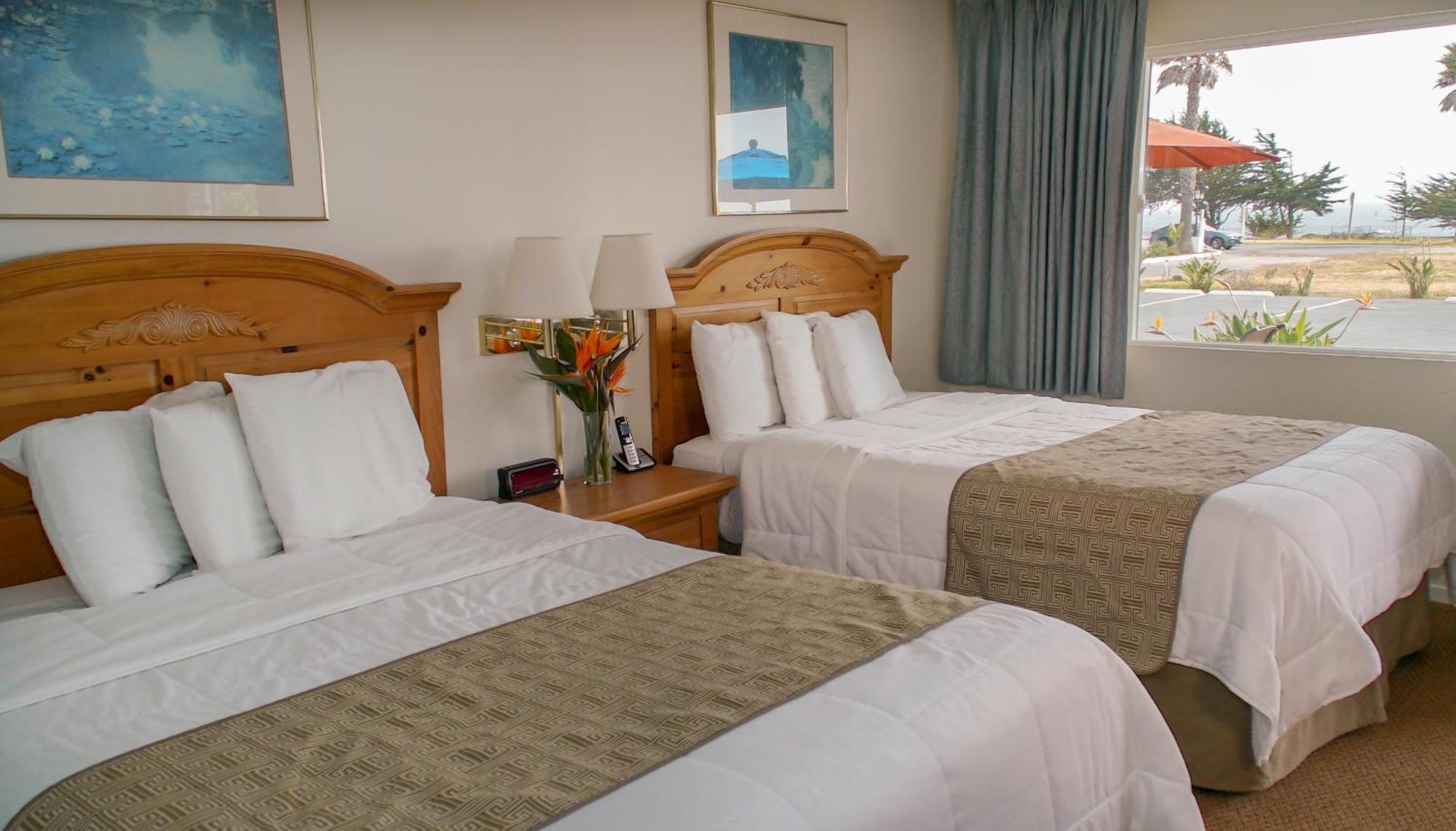 Kamer met Queensize Bed en Uitzicht op Zee