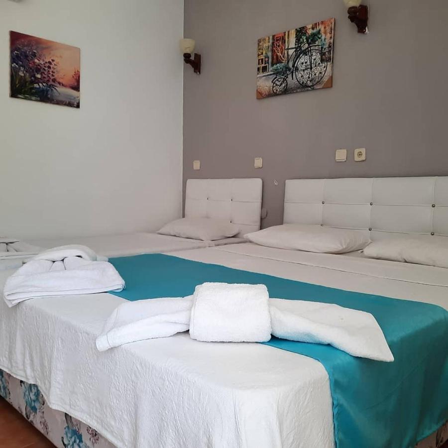 Dreibettzimmer mit Meerblick