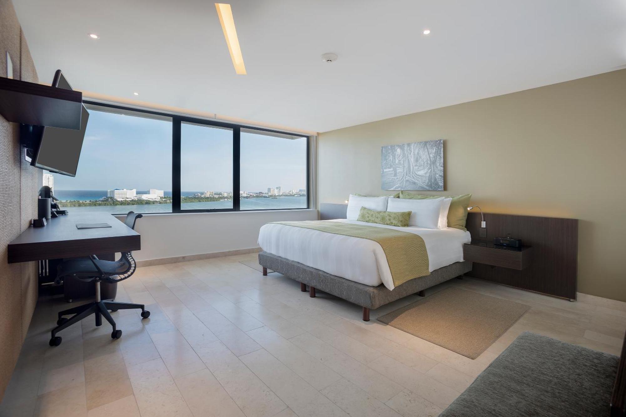 Suite met Kingsize Bed en Terras - Uitzicht op de Oceaan