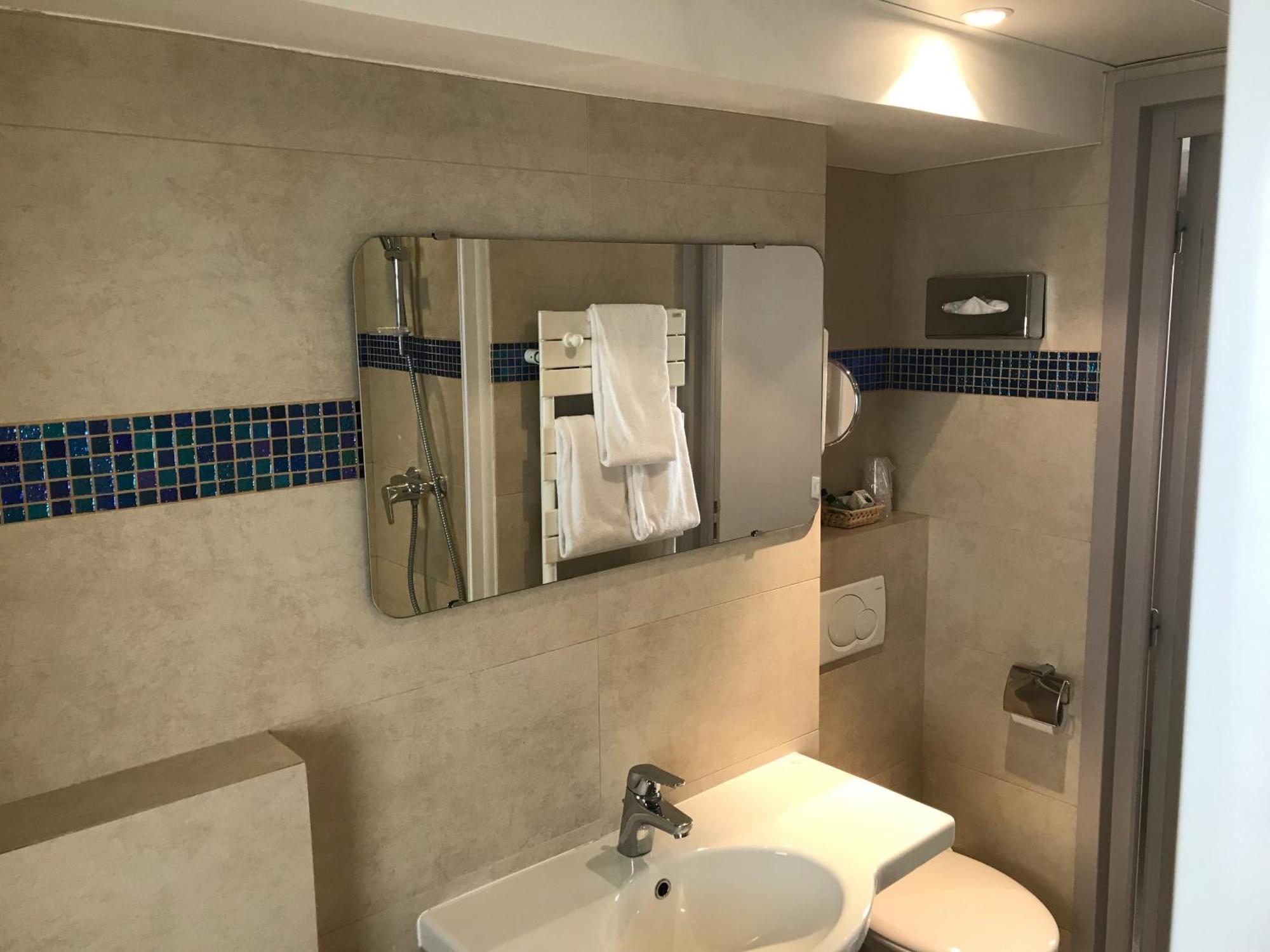 Chambre Triple avec Vue sur le Patio