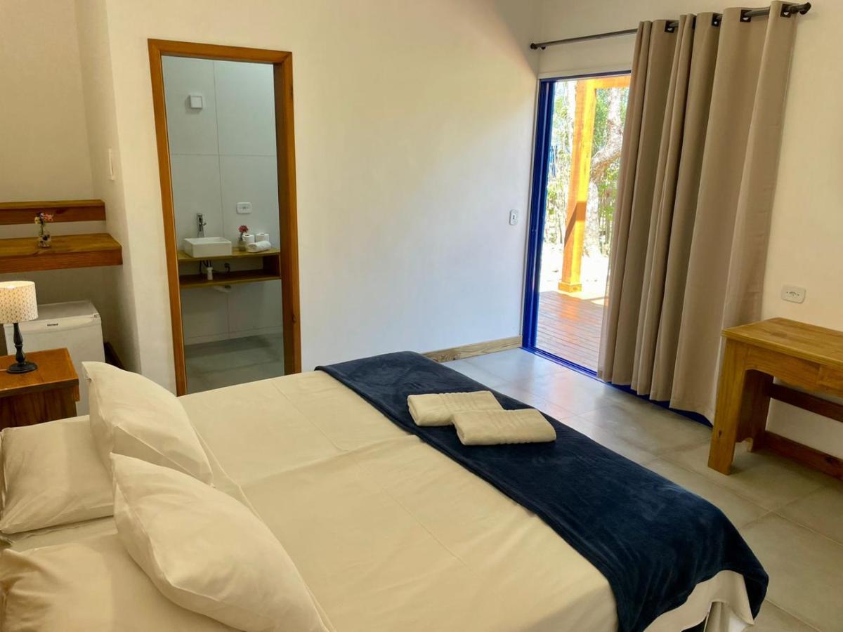 Suite met Queensize Bed en Uitzicht op Zee