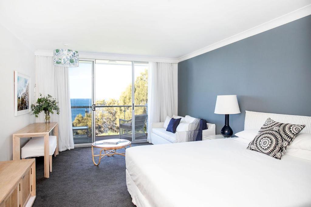 Habitación Doble Deluxe con balcón y vistas al mar