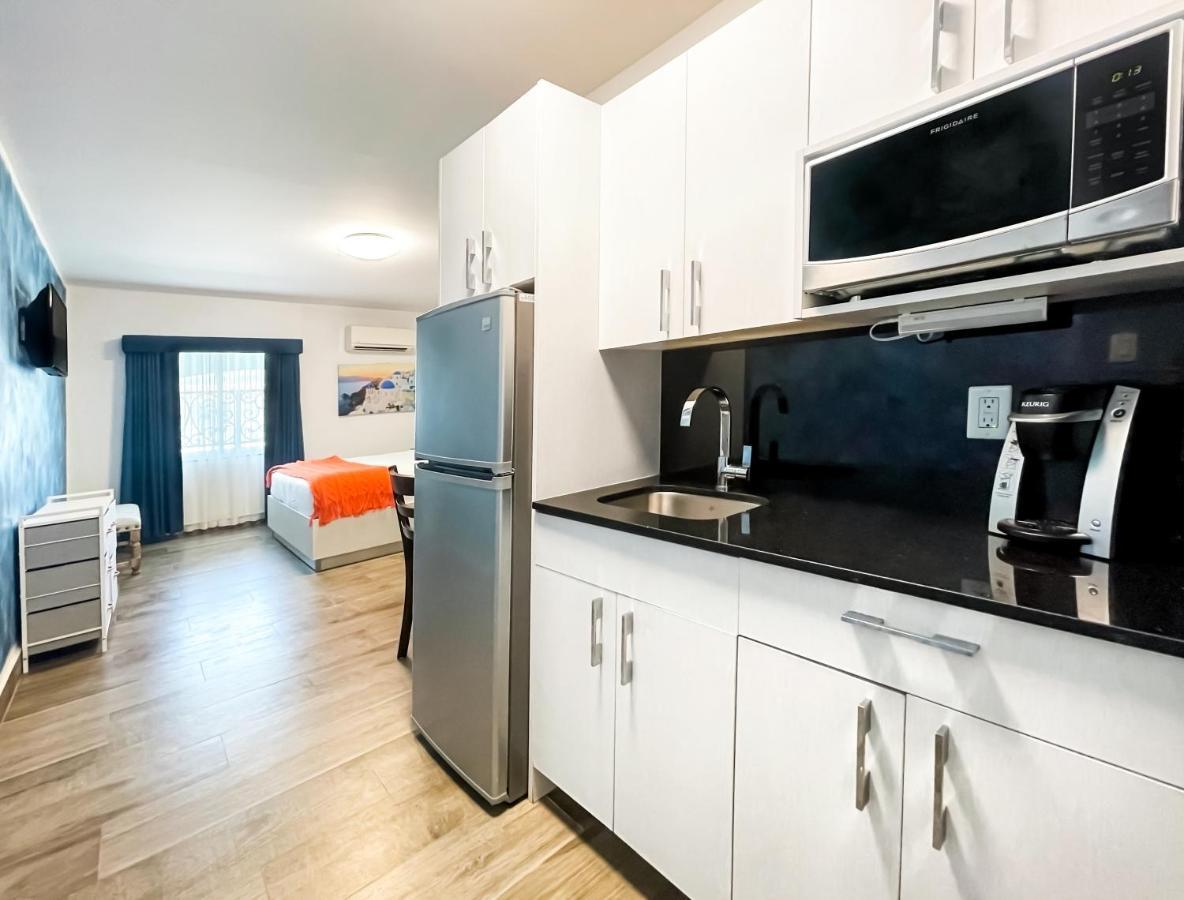 Hébergement Supérieur Côté Cour avec 1 Lit Queen-Size et Cuisine Complète