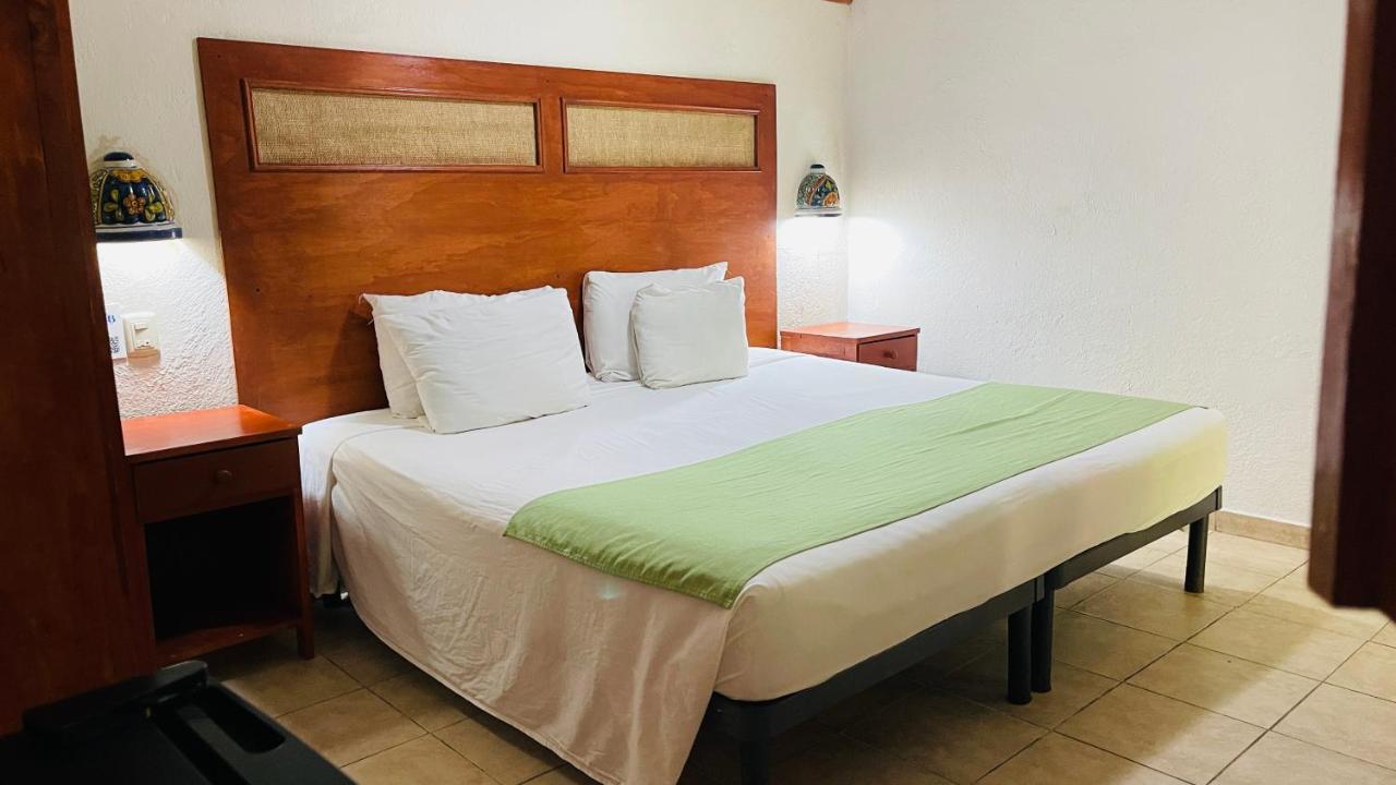Habitación con cama extragrande.