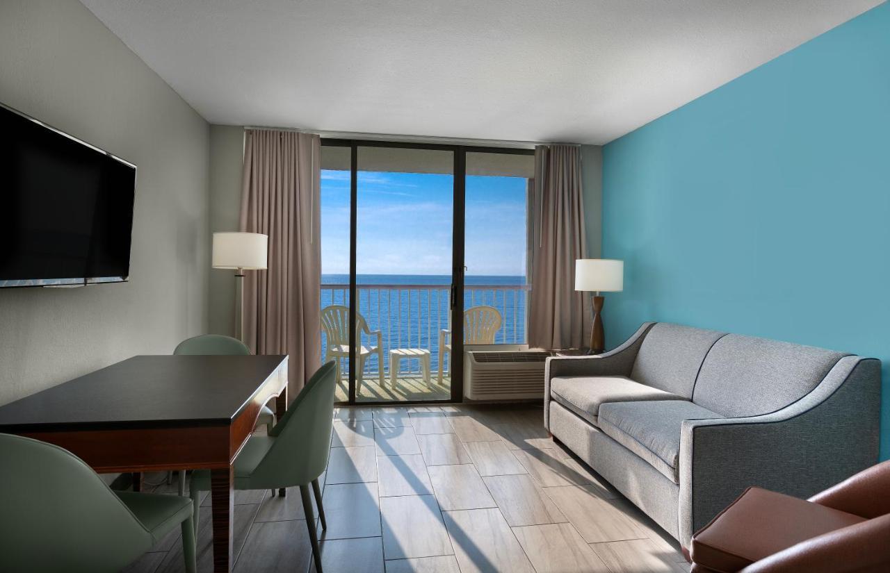 Suite con cama grande en primera línea de mar