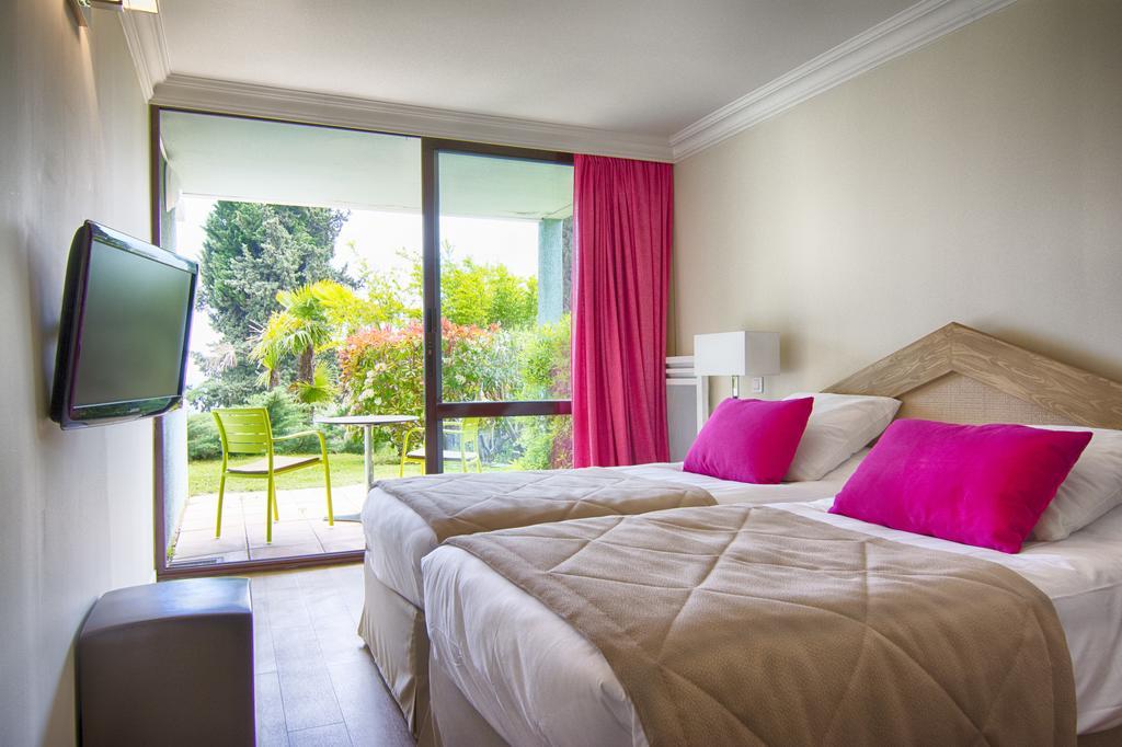 Quadruple Room (2 Adults + 2 Children)