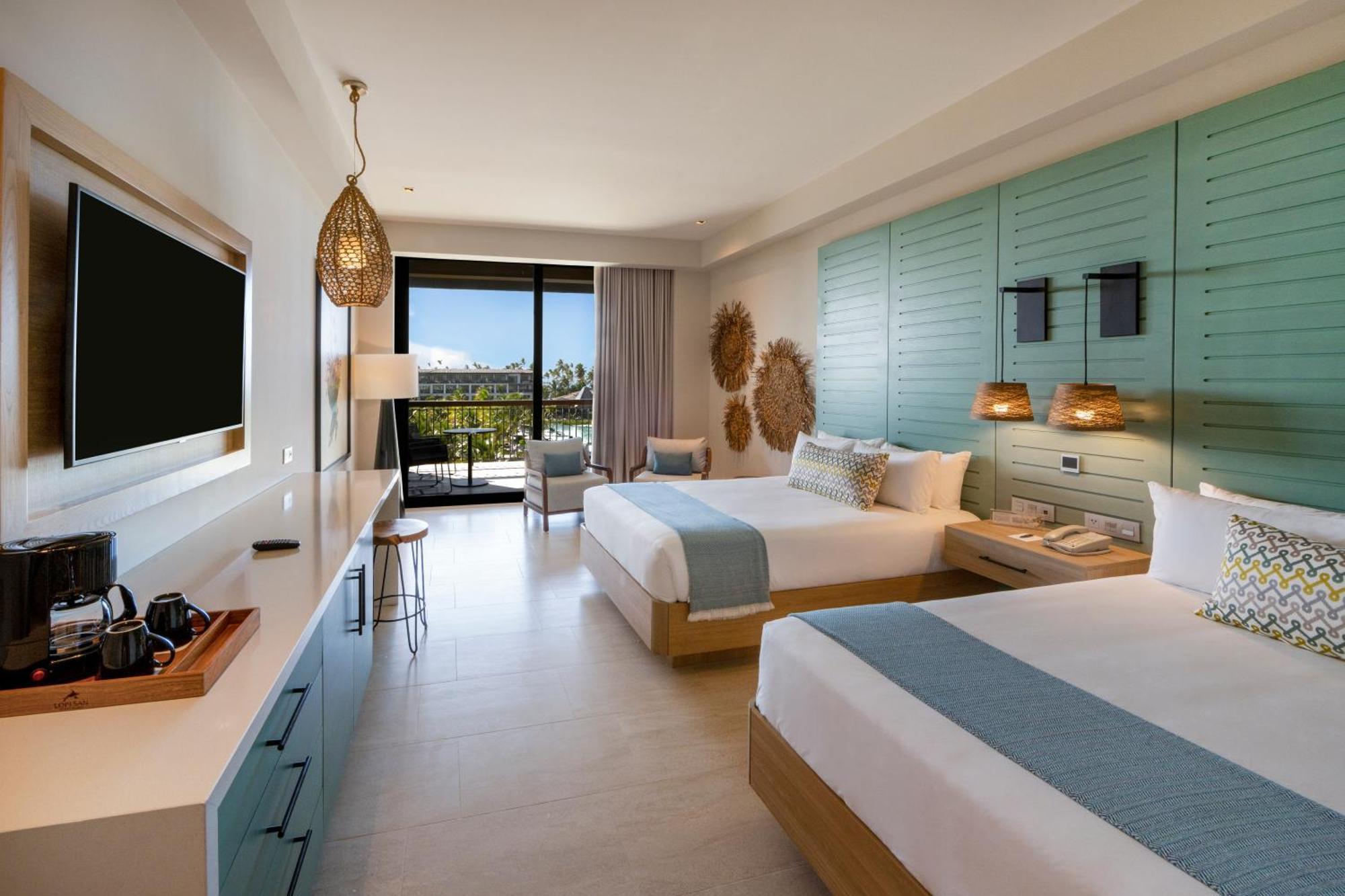 Suite Junior Unique con cama grande y vistas al mar