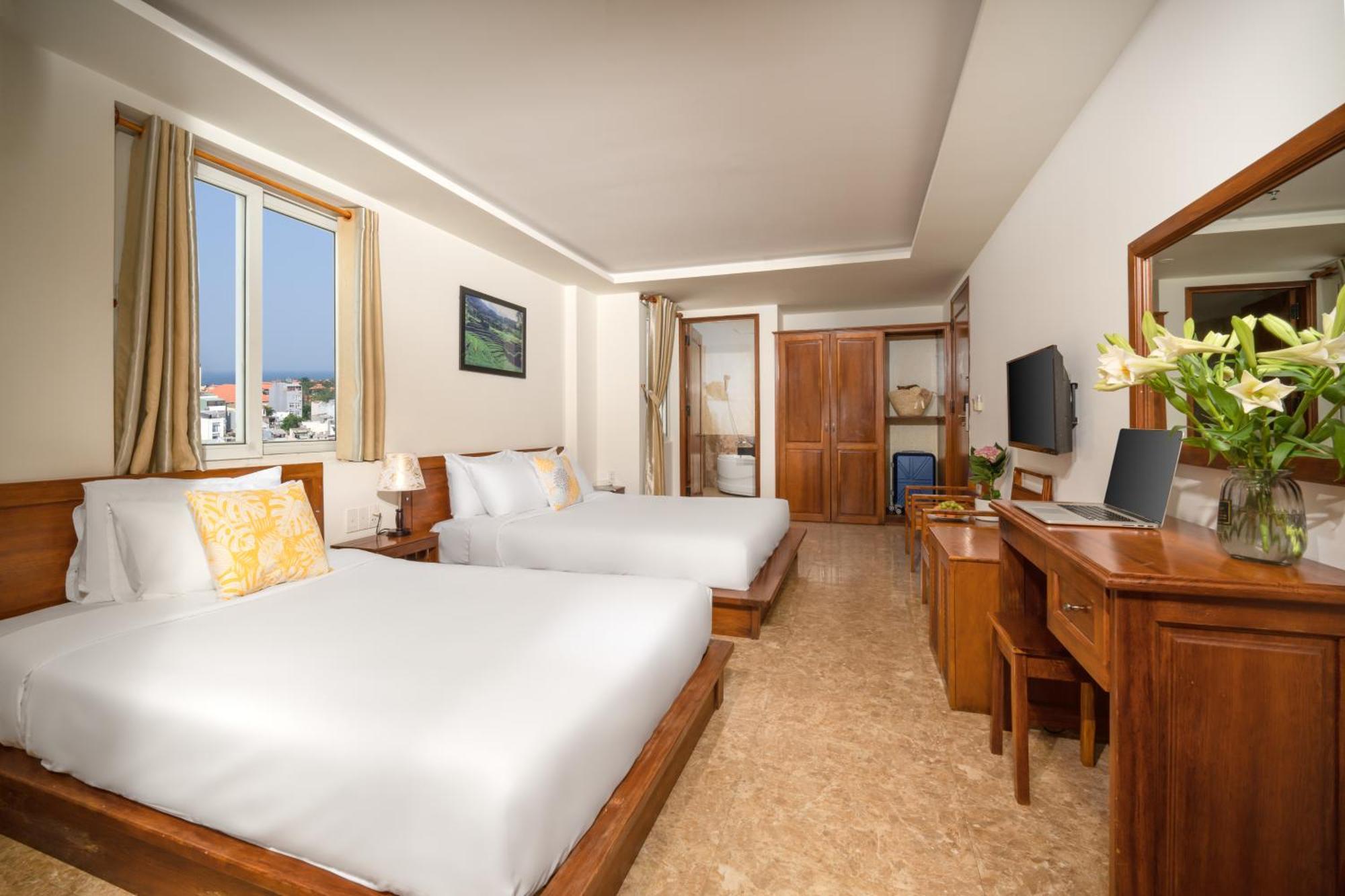 Habitación Triple Deluxe con vistas a la ciudad