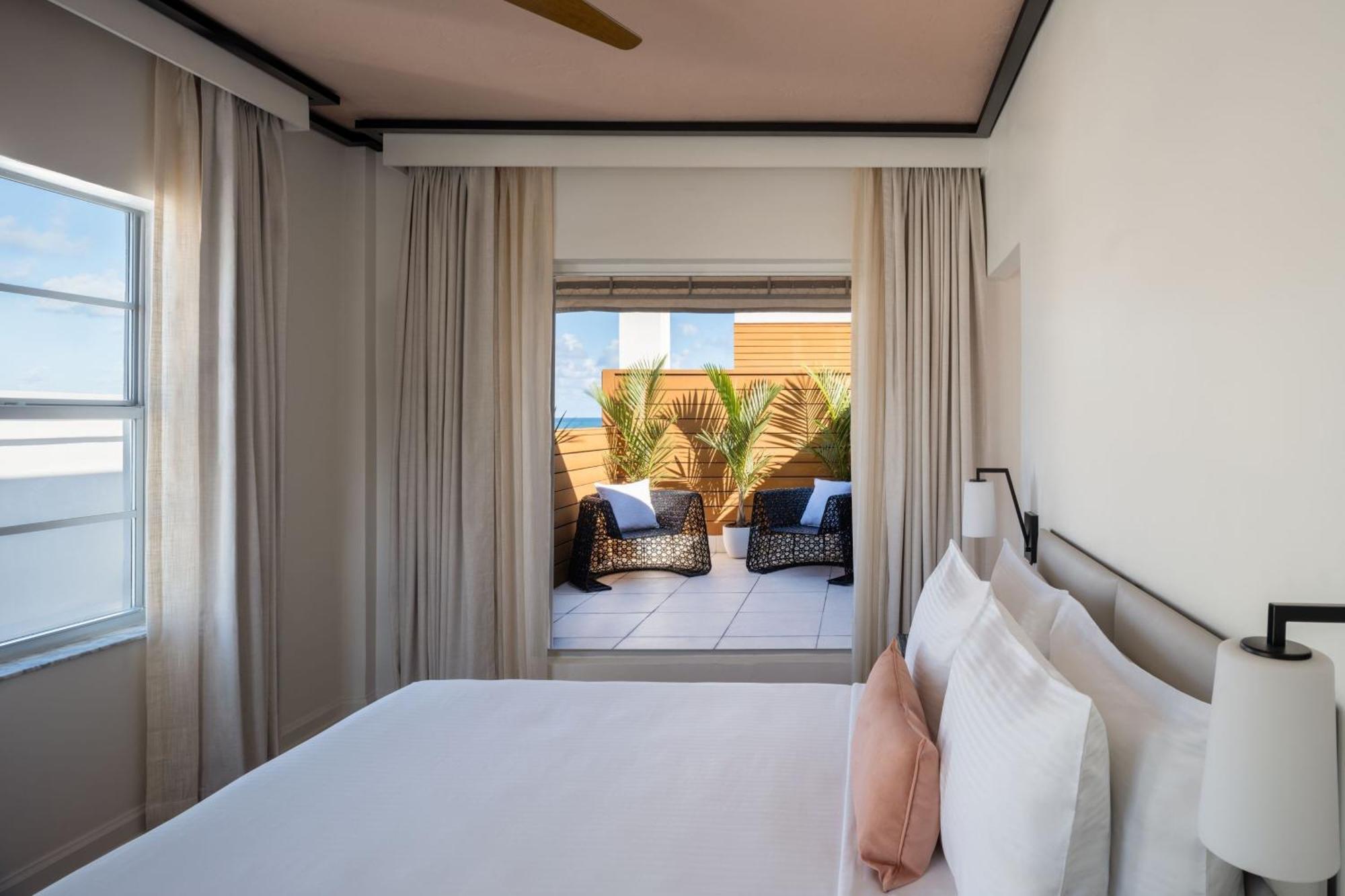 Habitación Premium con vistas parciales al mar y jardín en la azotea - Cama grande