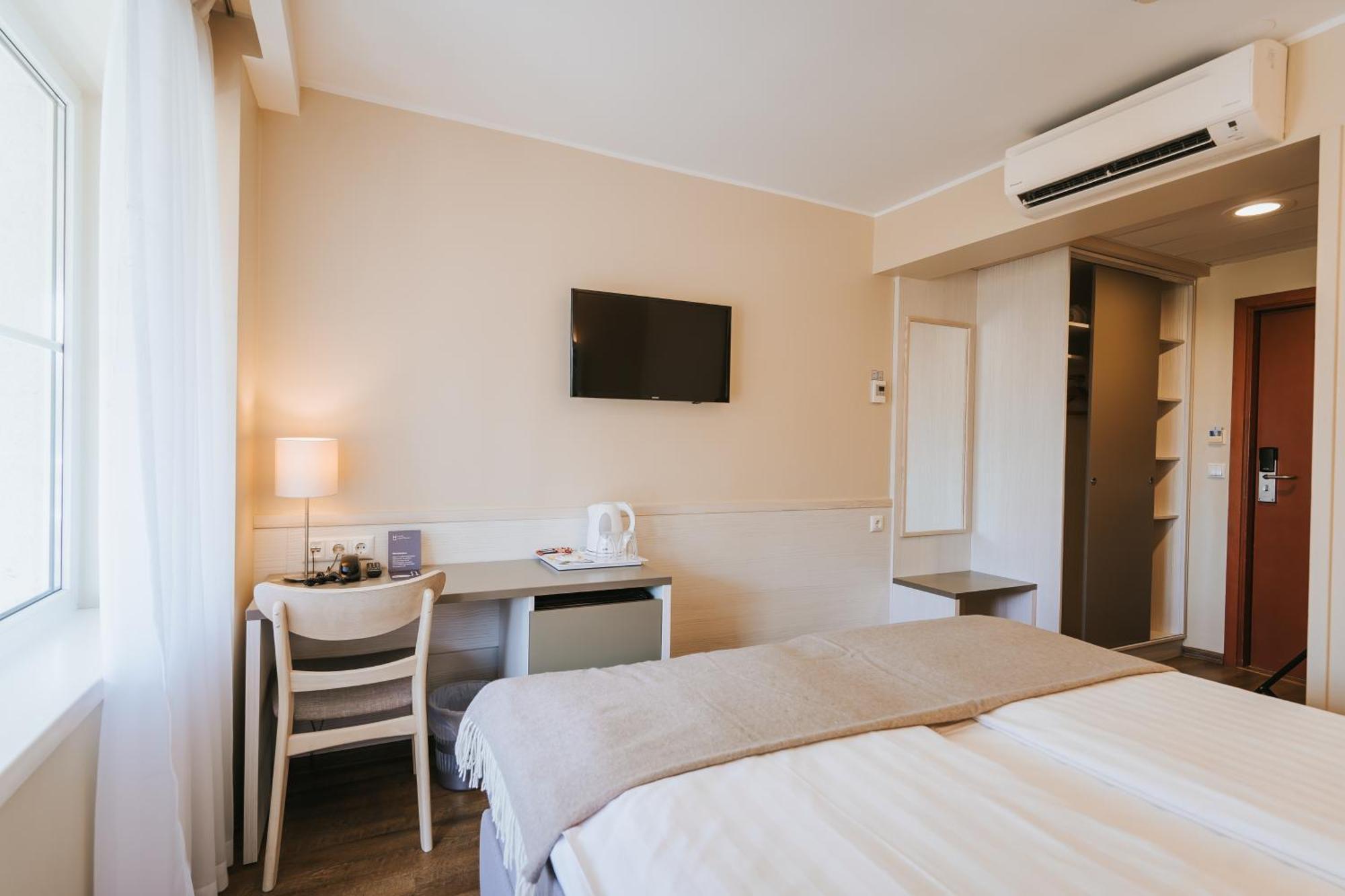 Habitación Doble con balcón y acceso al spa