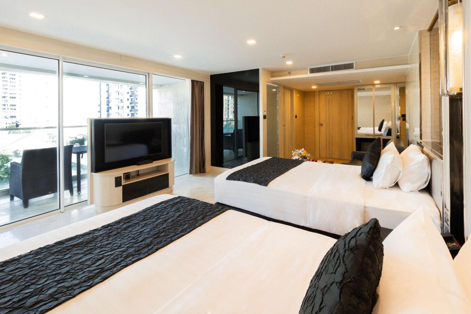 Junior Suite met 2 Aparte Bedden - Balkon en Uitzicht op de Stad - Rookvrij