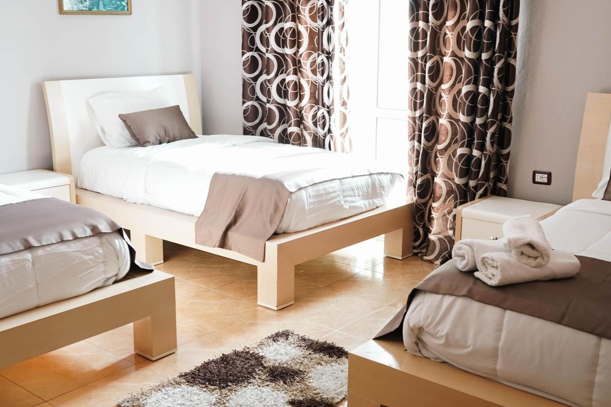 Quadruple Room with Balcony and Partial Sea View