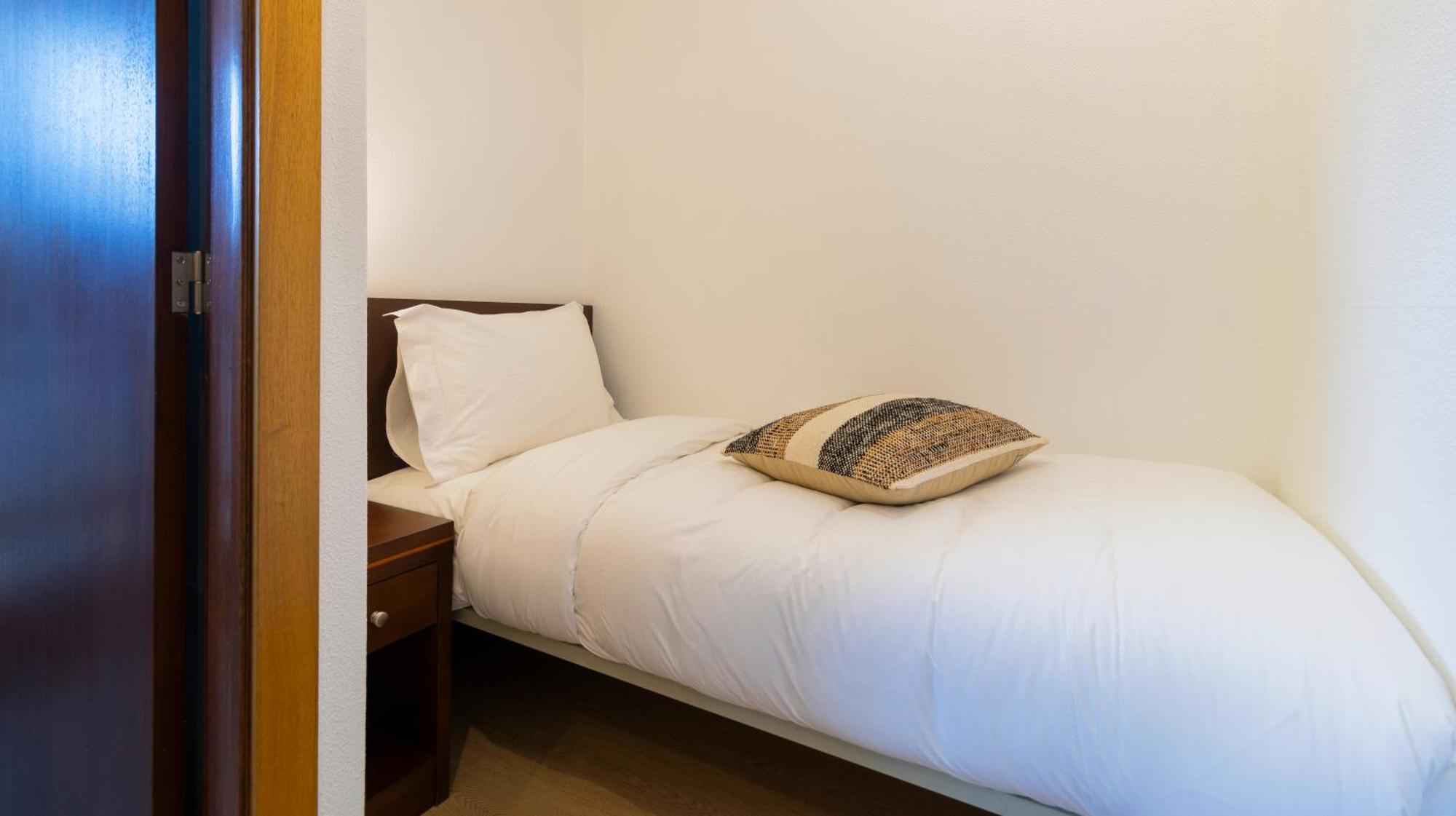 Dreibettzimmer mit Balkon