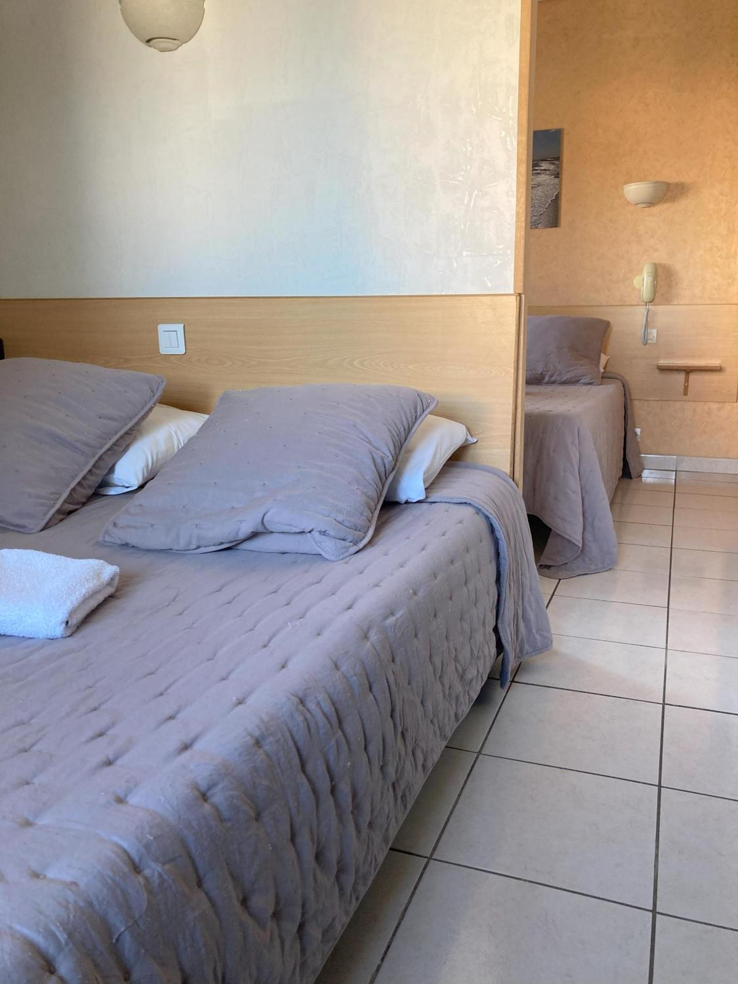 Habitación Cuádruple (2 adultos + 2 niños)