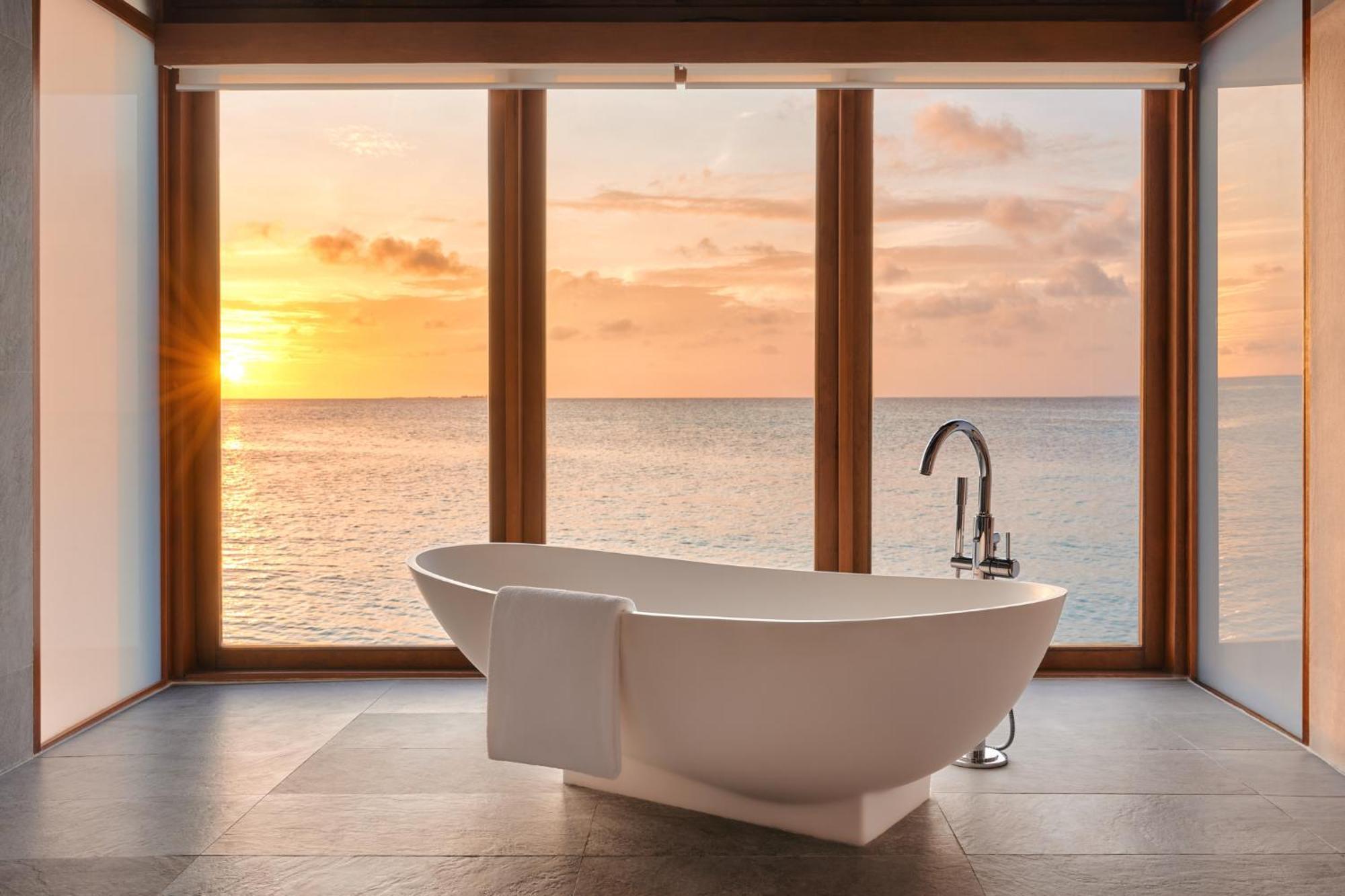 Sunset Over Water Villa