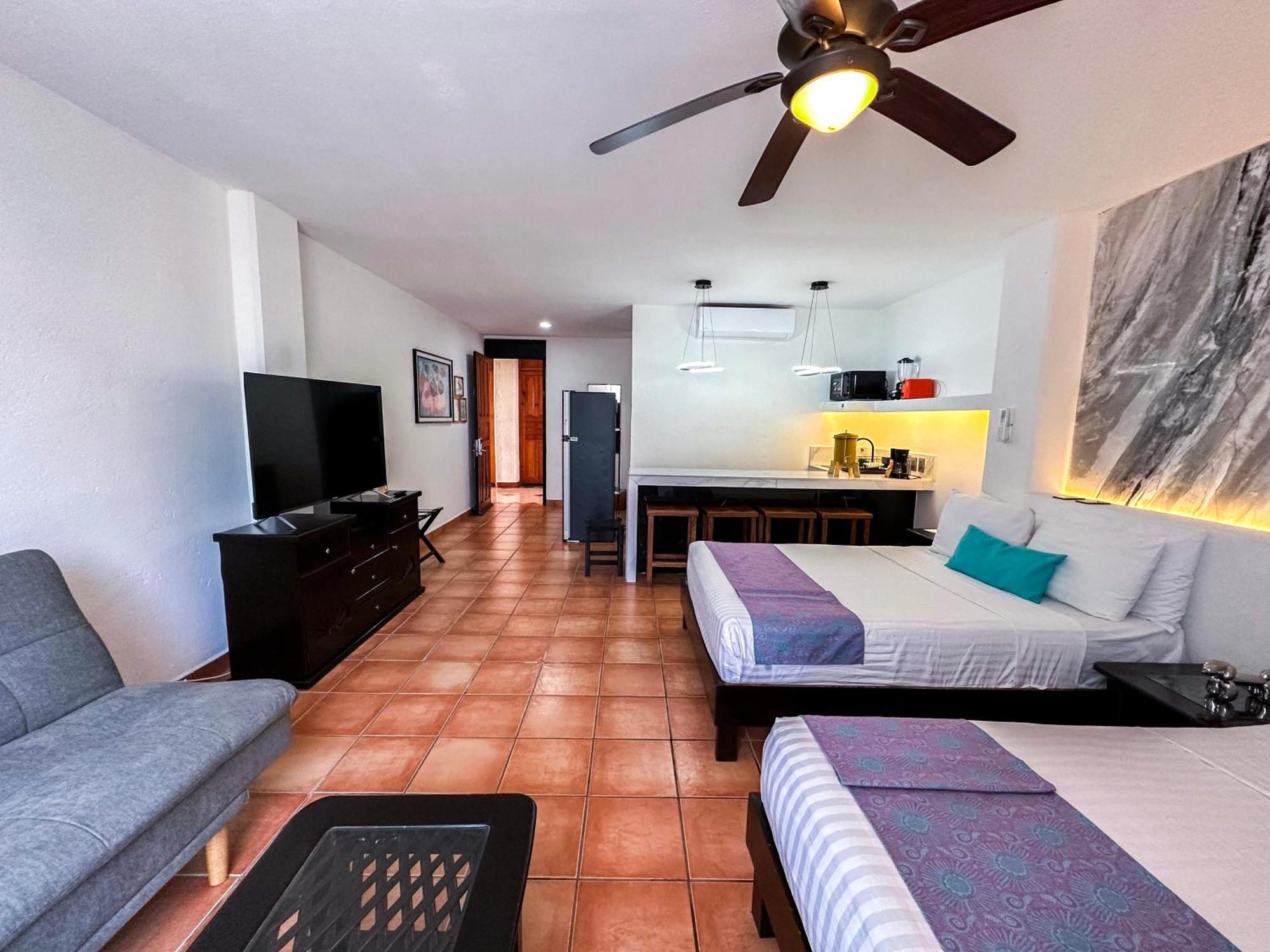 Suite Doble con 2 camas dobles y sofá cama - No fumadores