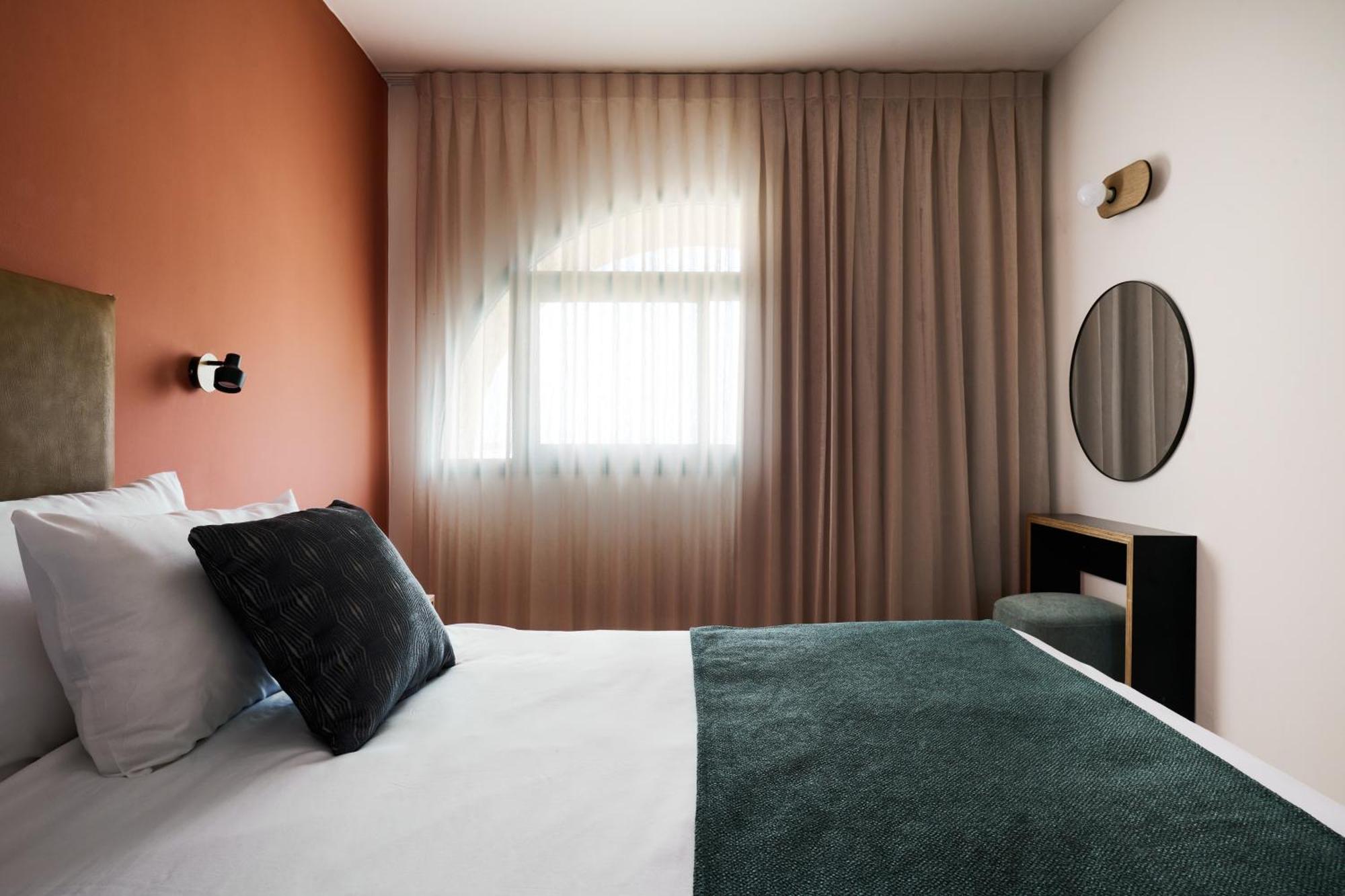 One-Bedroom Suite with Balcony and Pool View