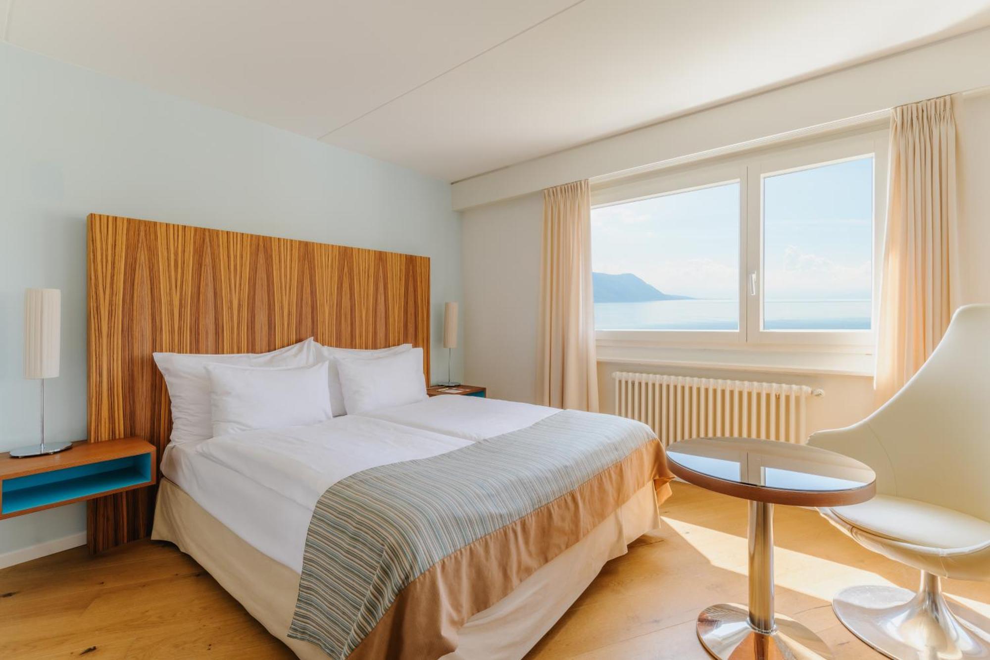 Cosy Mona - uitzicht op het meer en balkon