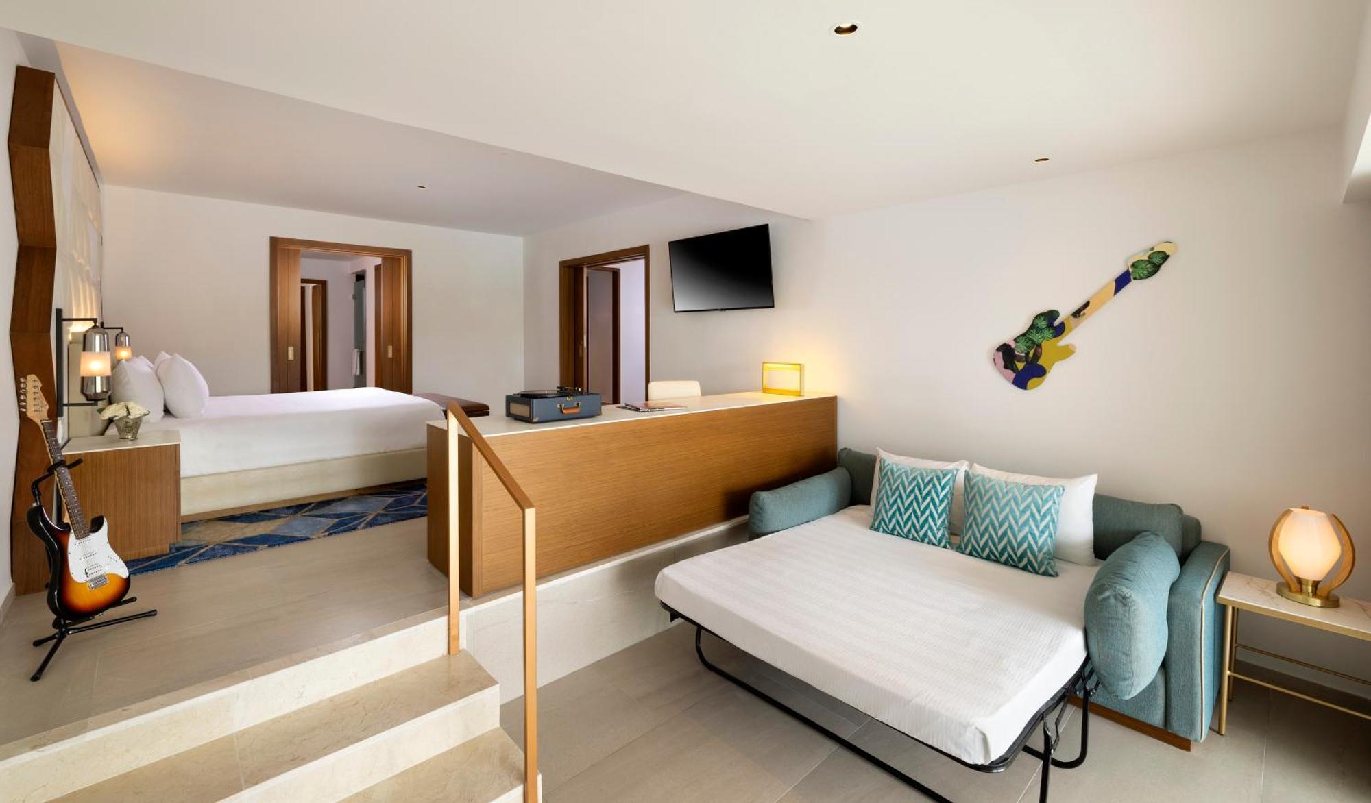 Rock Suite met 1 Slaapkamer, Kingsize Bed, Slaapbank en Persoonlijke Assistent