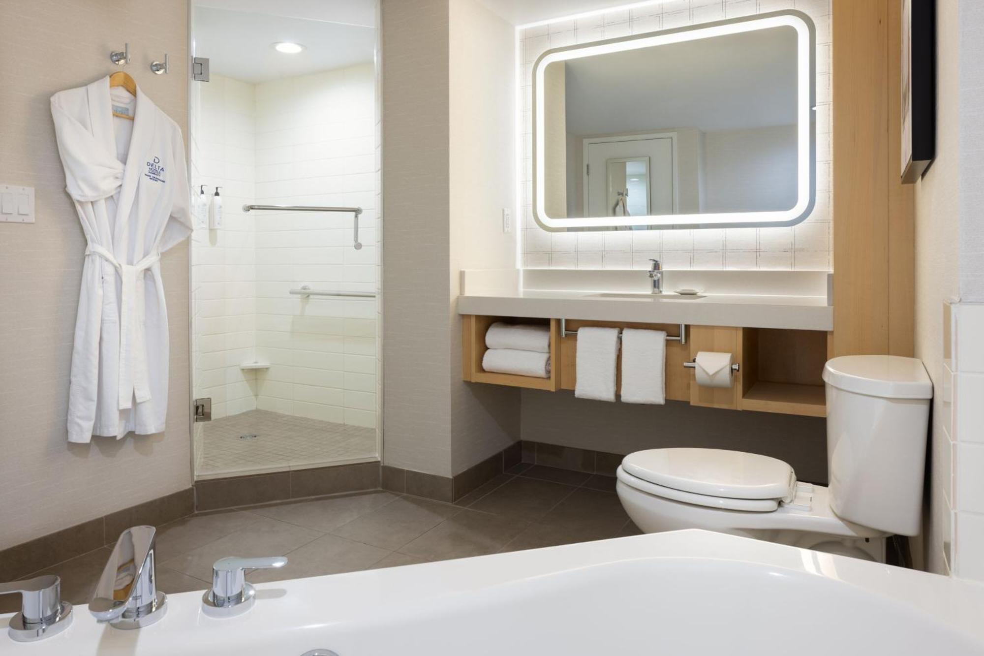 Habitación Deluxe con 2 camas grandes y sofá cama