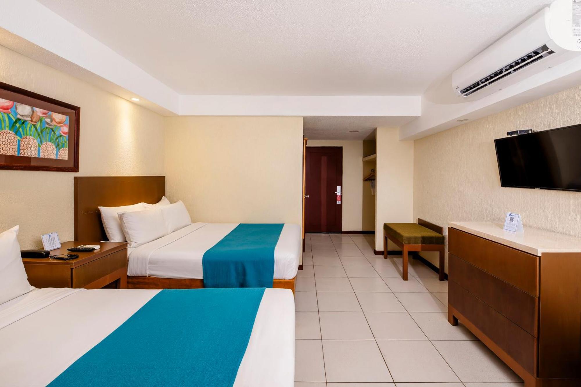 Double Room with Two Double Beds, Balcony and Pool View - Non-Smoking