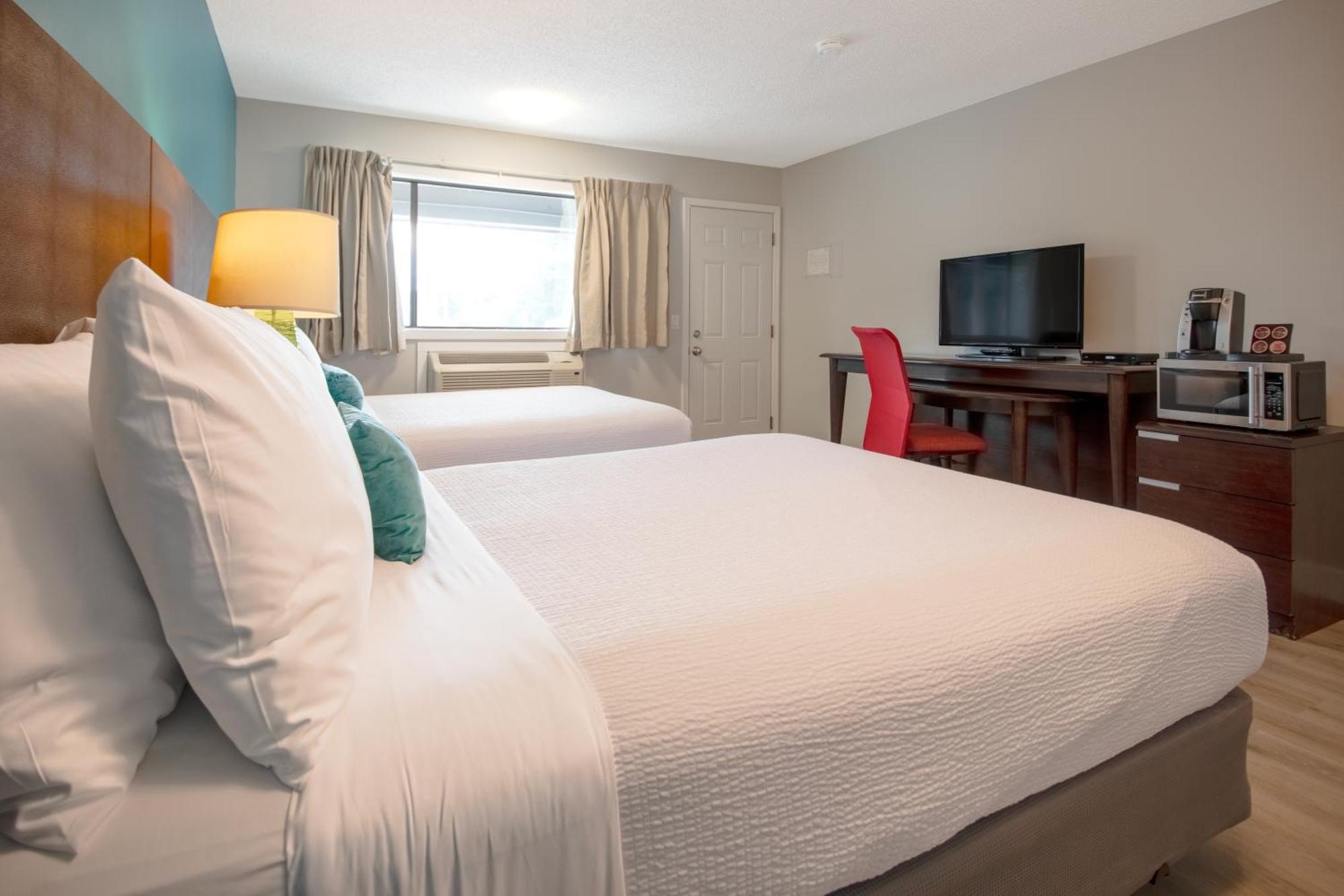 Kamer met 2 Queensize Bedden