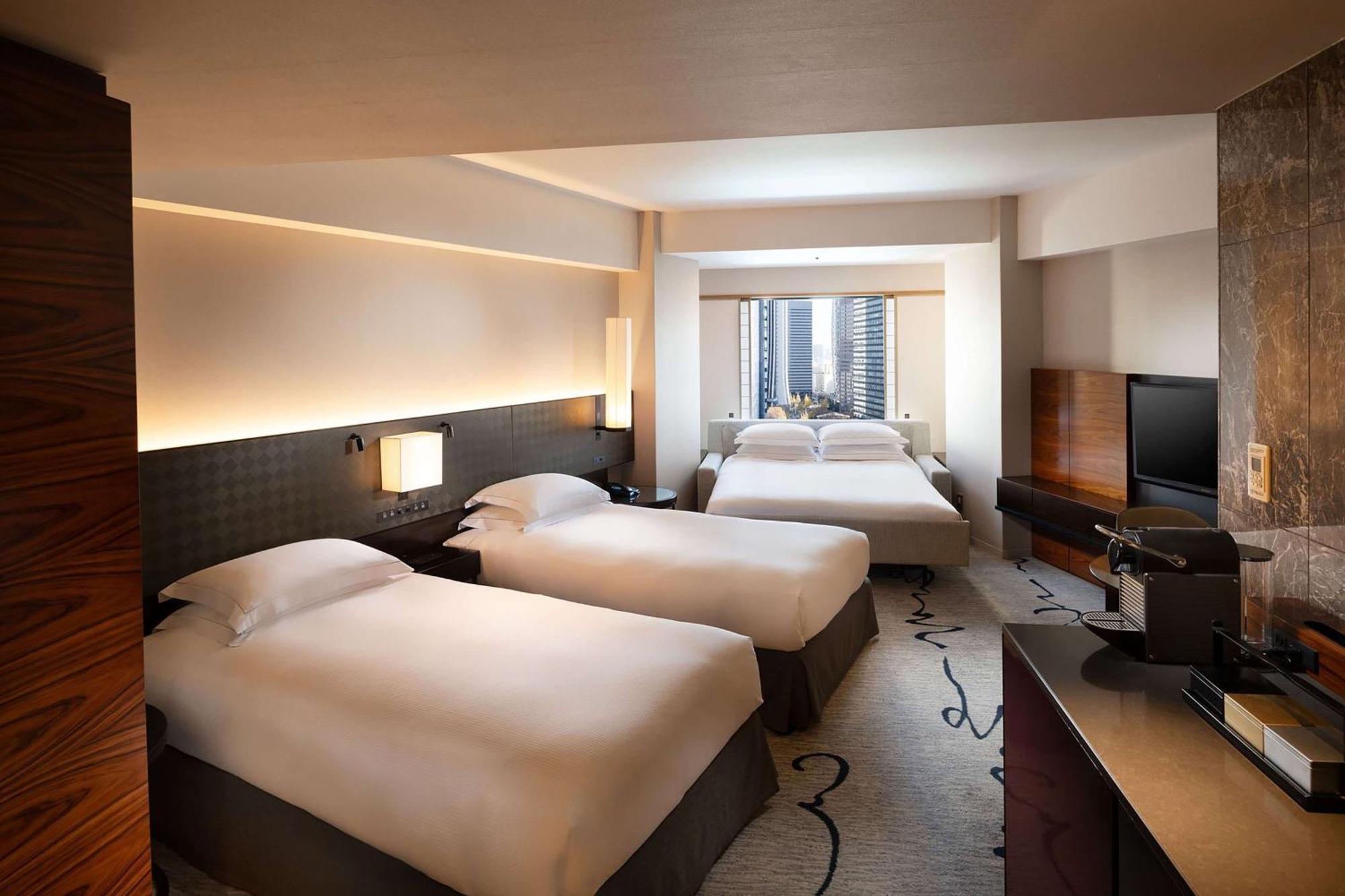 Premium Tweepersoonskamer met 2 Aparte Bedden en Slaapbank