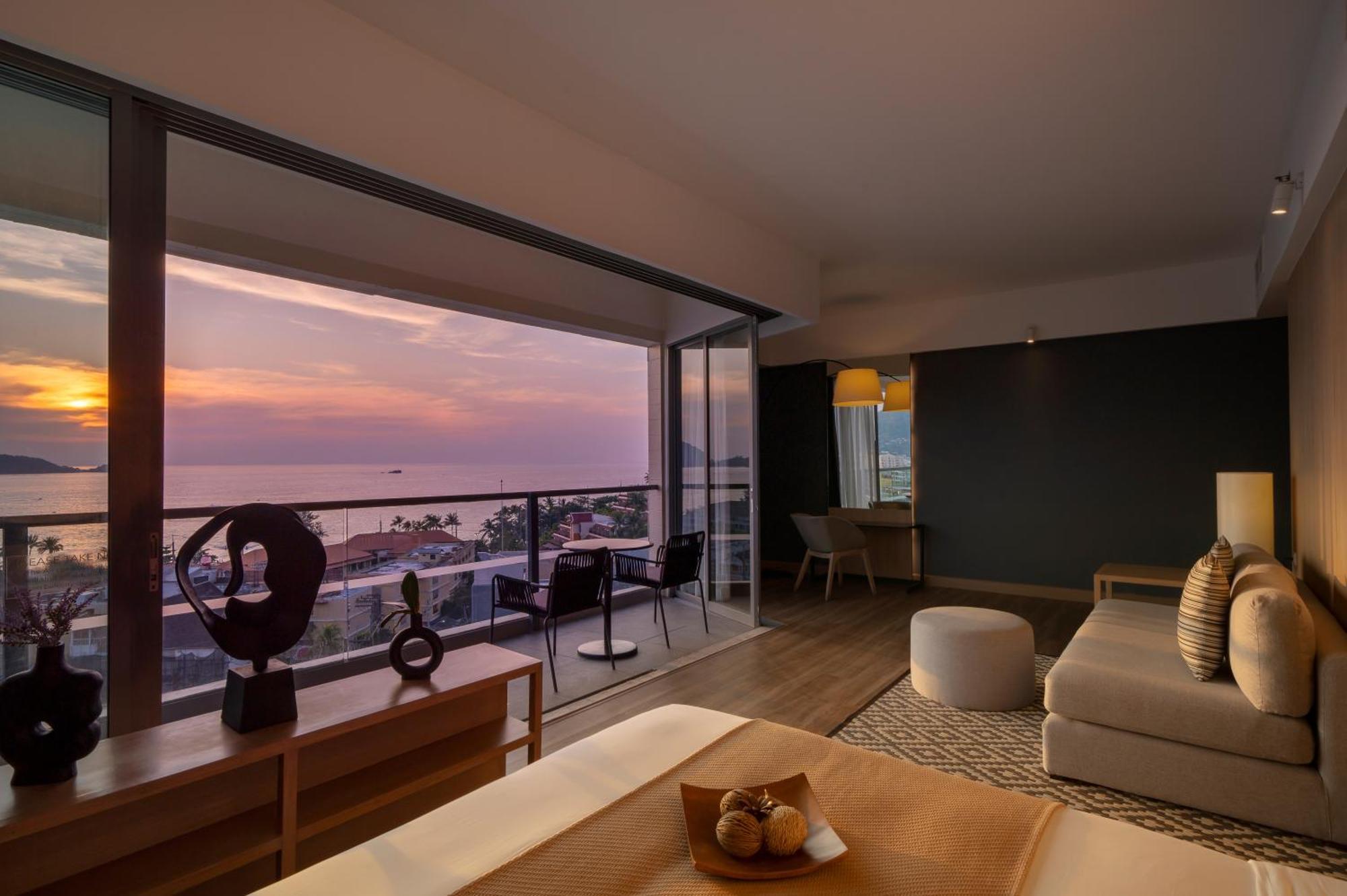 Suite con balcón y vistas al mar - 1 cama extragrande