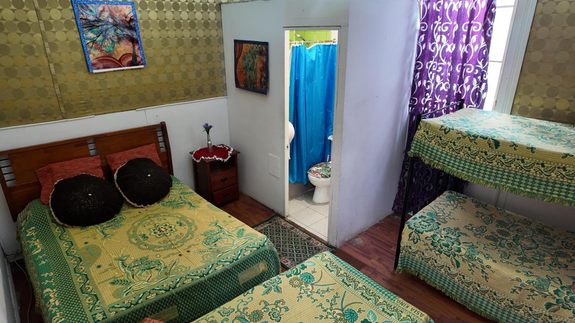 Quadruple Room with Private Bathroom