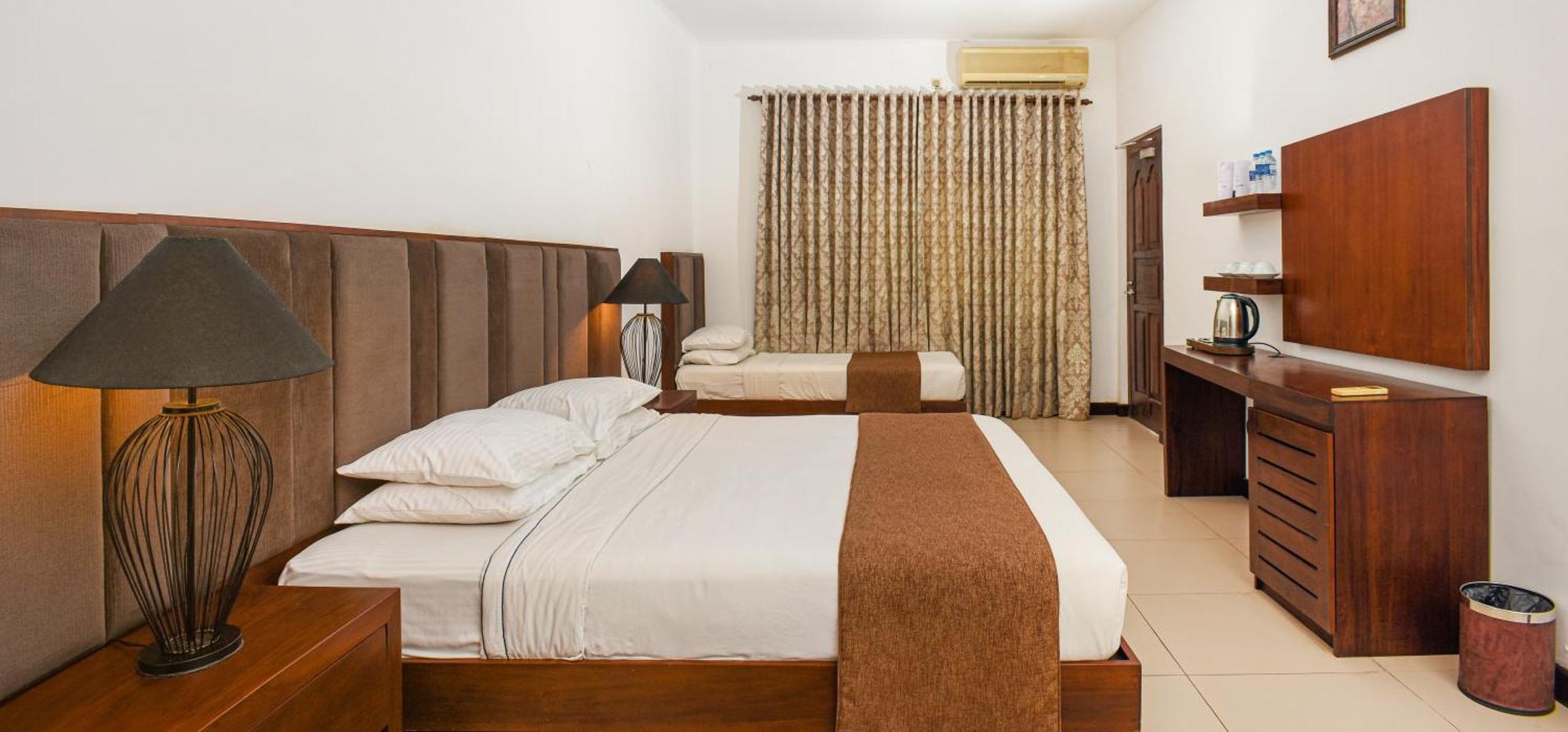 Deluxe Triple Room