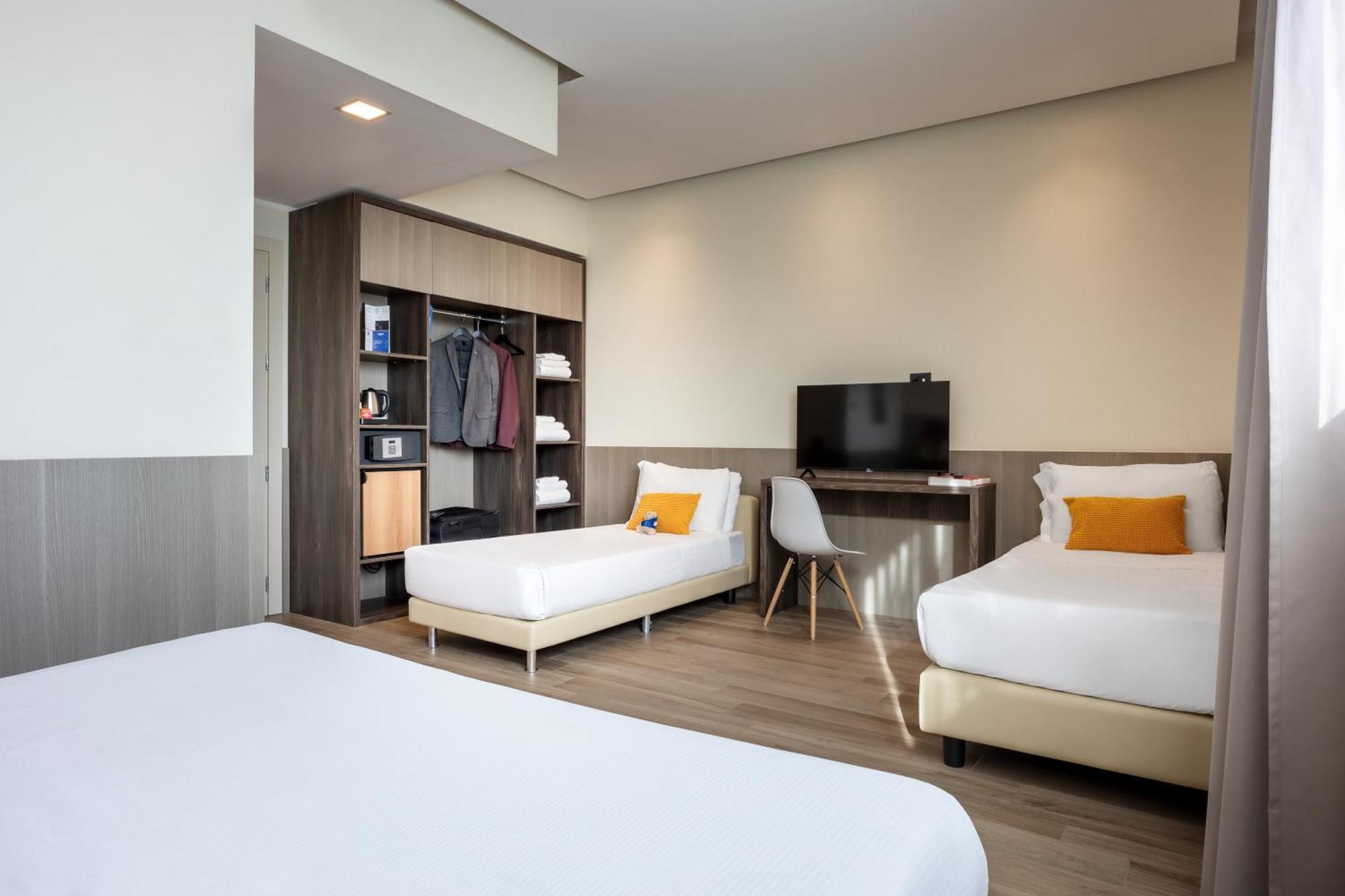 Habitación Cuádruple Deluxe