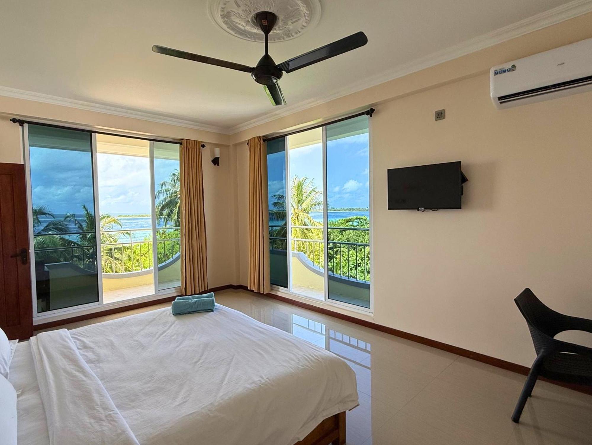 Habitación Doble Deluxe con balcón y vistas al mar