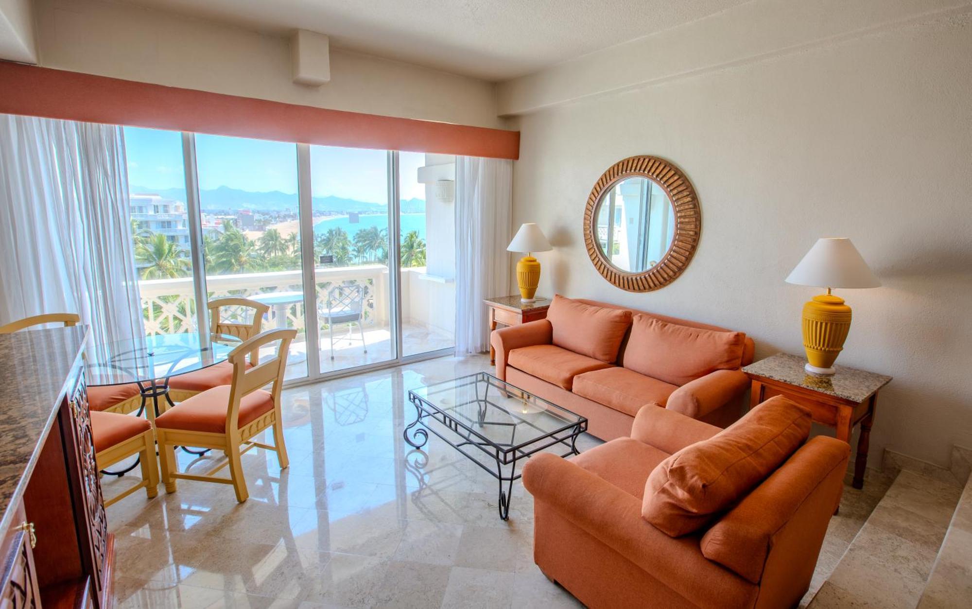 Junior Suite Deluxe con vistas al océano (3 adultos y 1 niño)