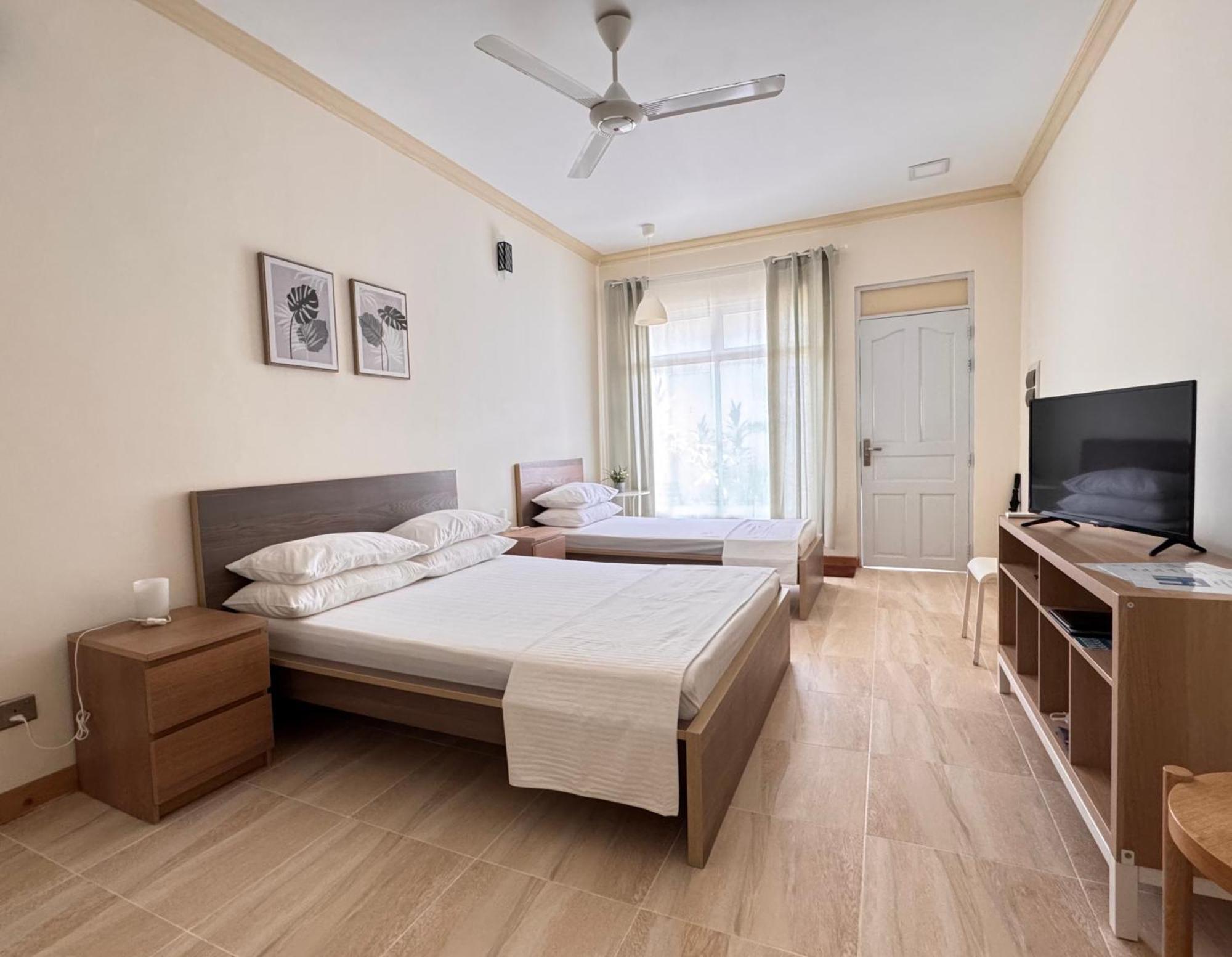 Deluxe Triple Room
