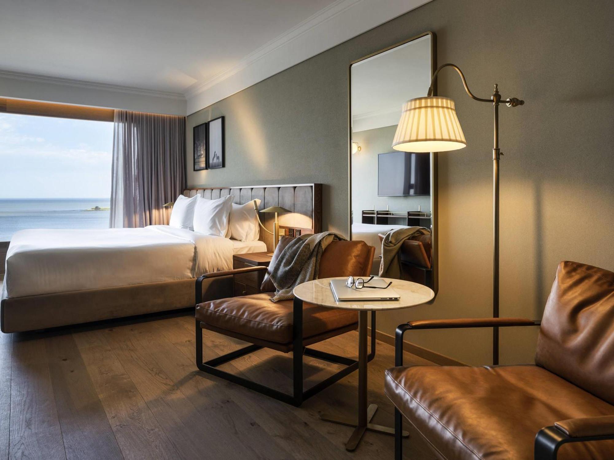 Habitación Deluxe con cama extragrande y vistas al mar