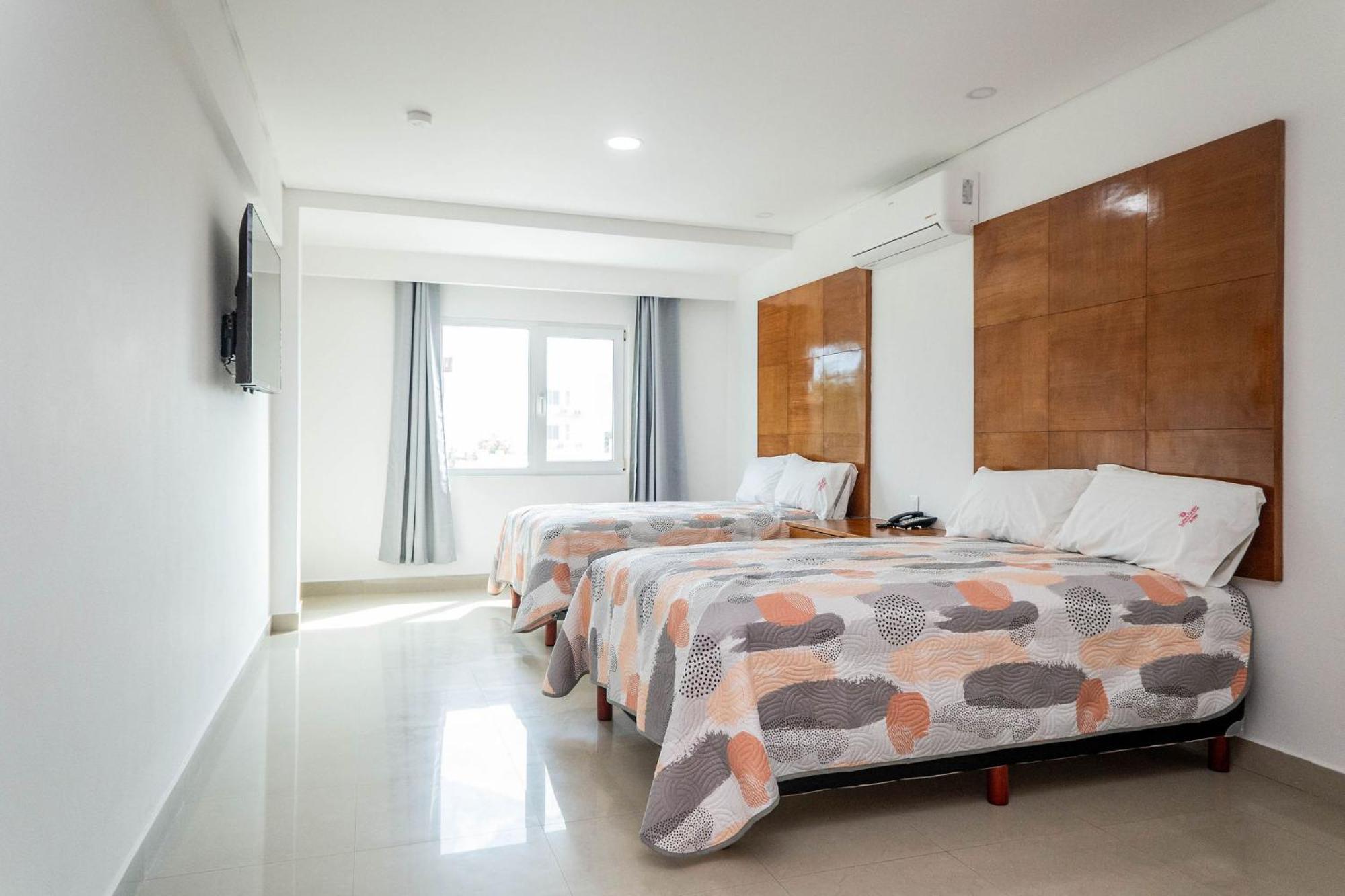 Habitación Doble Superior - 2 camas dobles