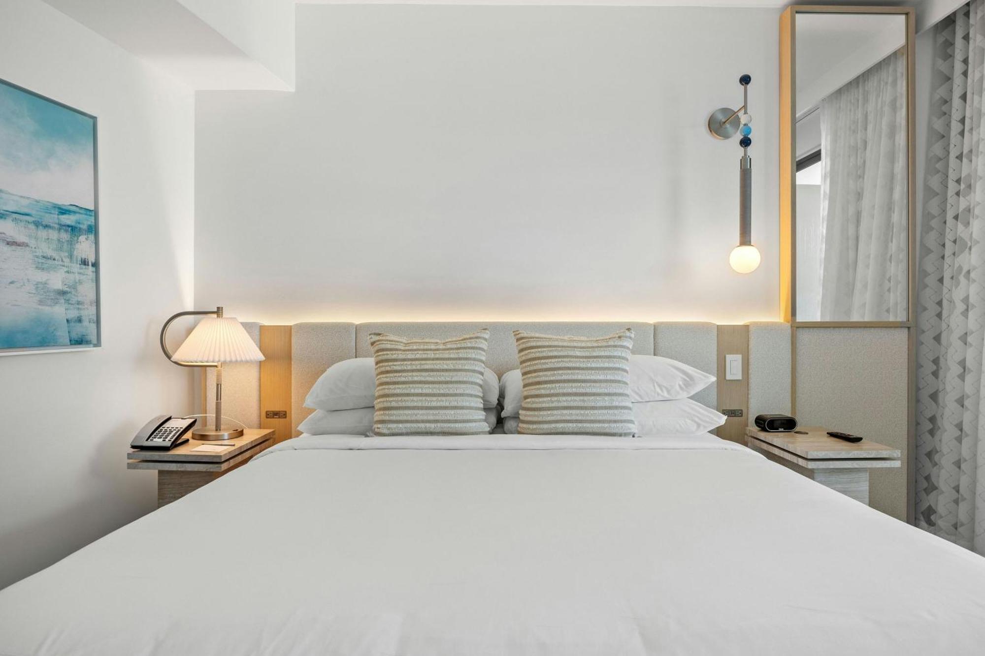 One-Bedroom Deluxe King Suite Sofa Bed Partial Ocean View