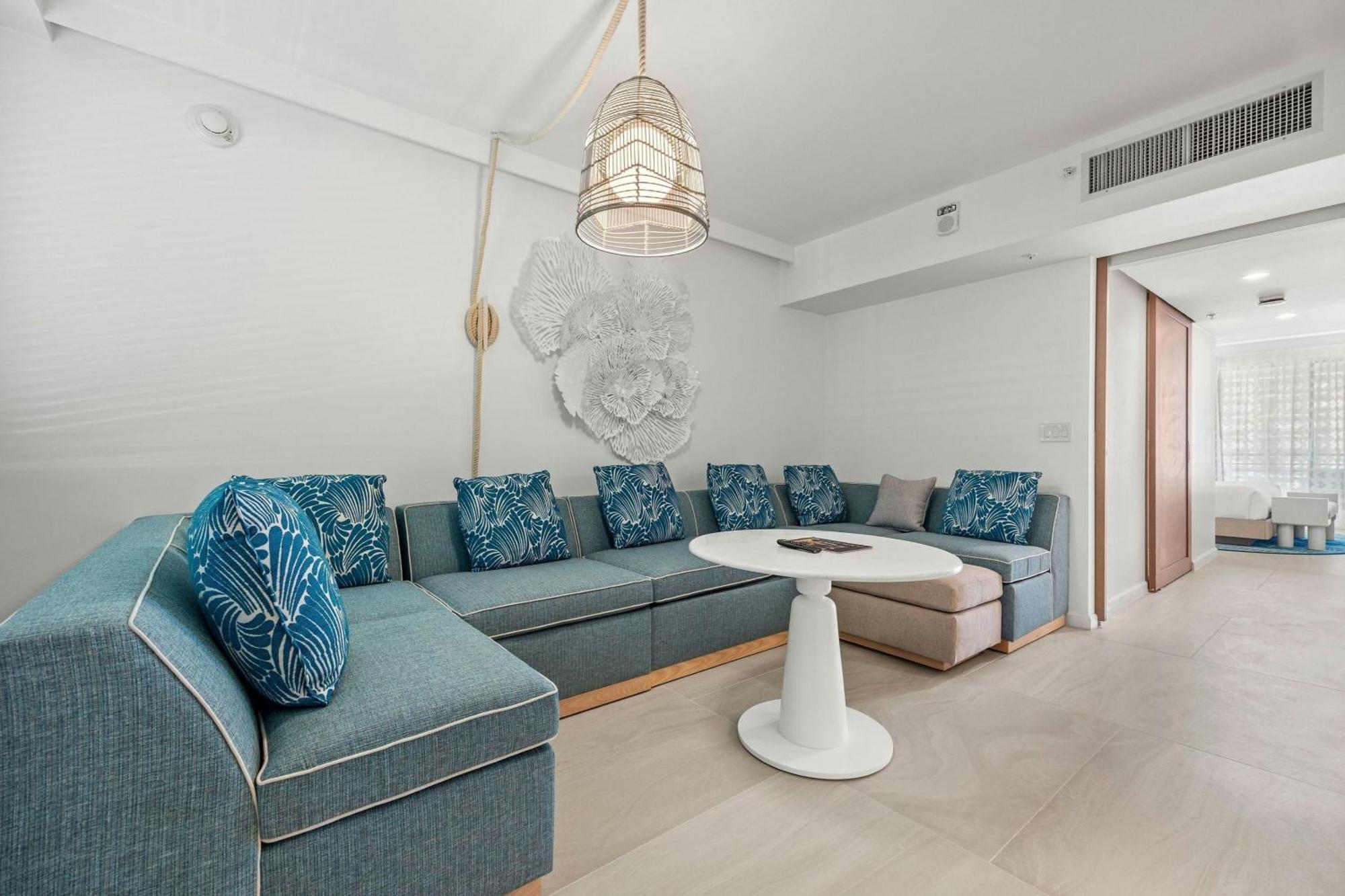 One-Bedroom Deluxe King Suite Sofa Bed Partial Ocean View