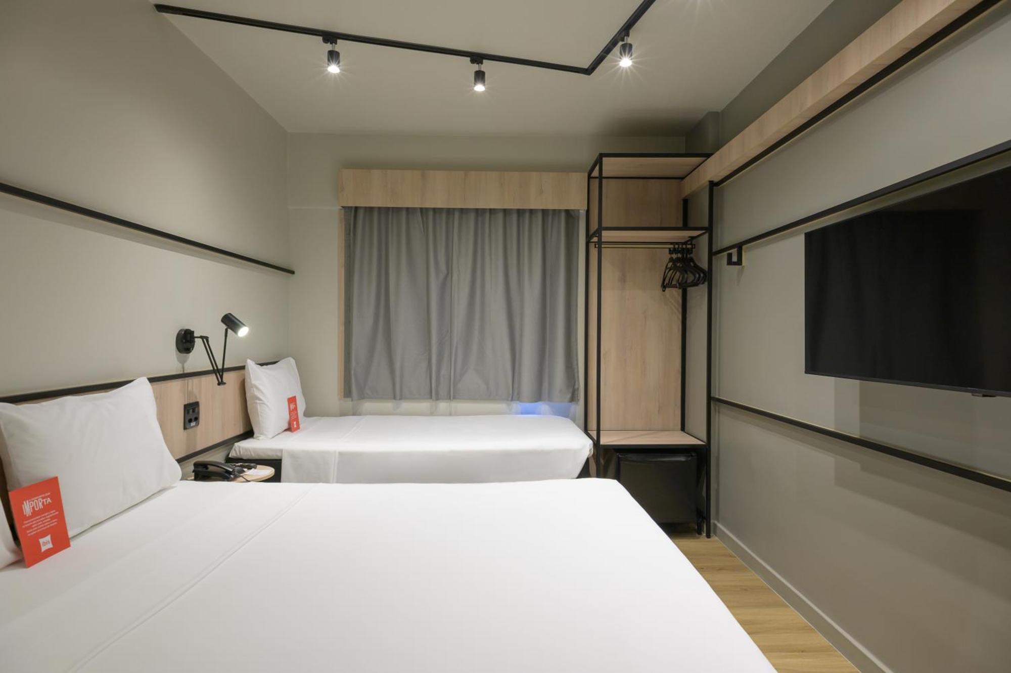 Room with a Double Bed and One Single Bed