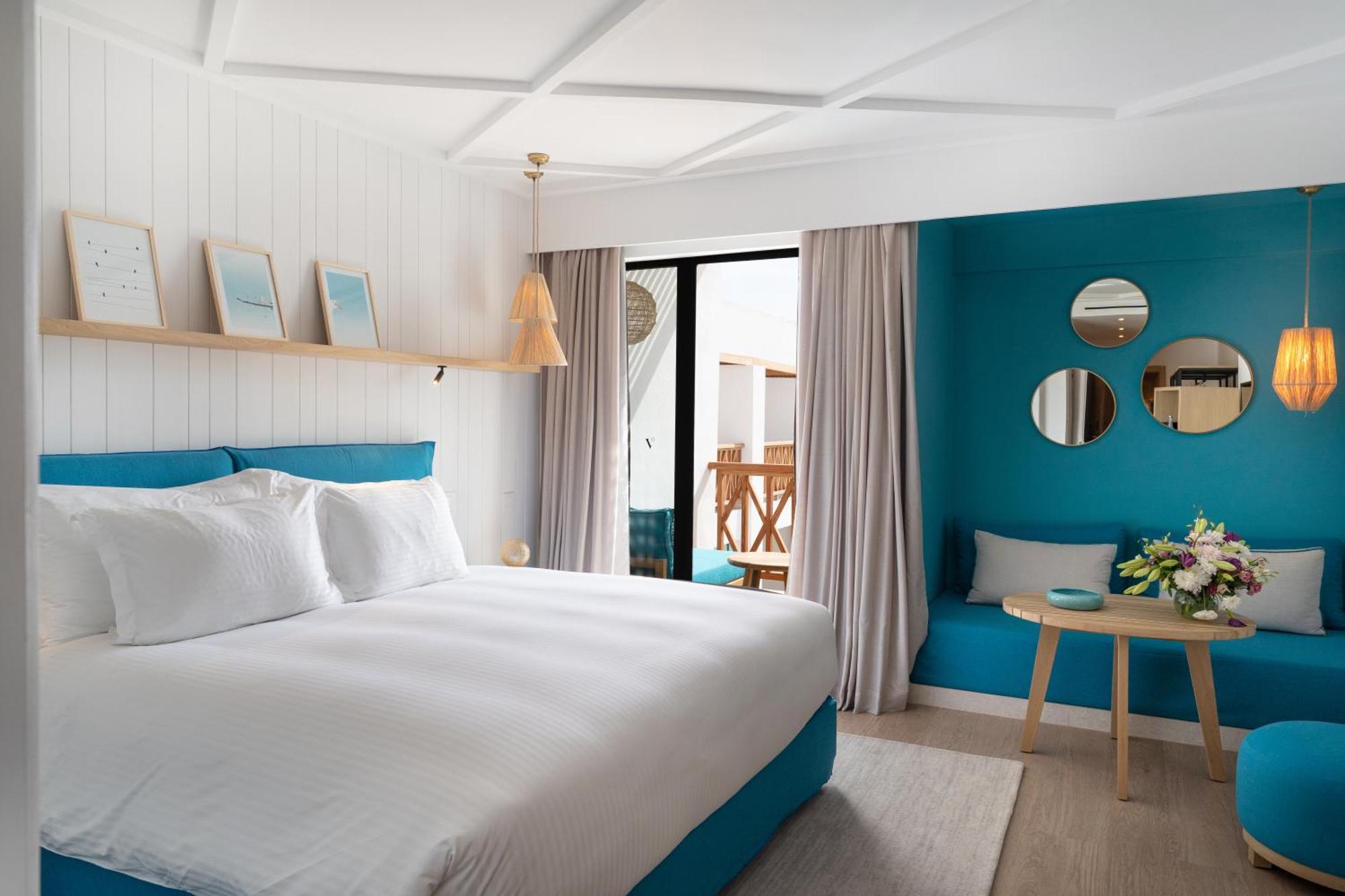 Deluxe Zimmer mit Kingsize-Bett und Gartenblick