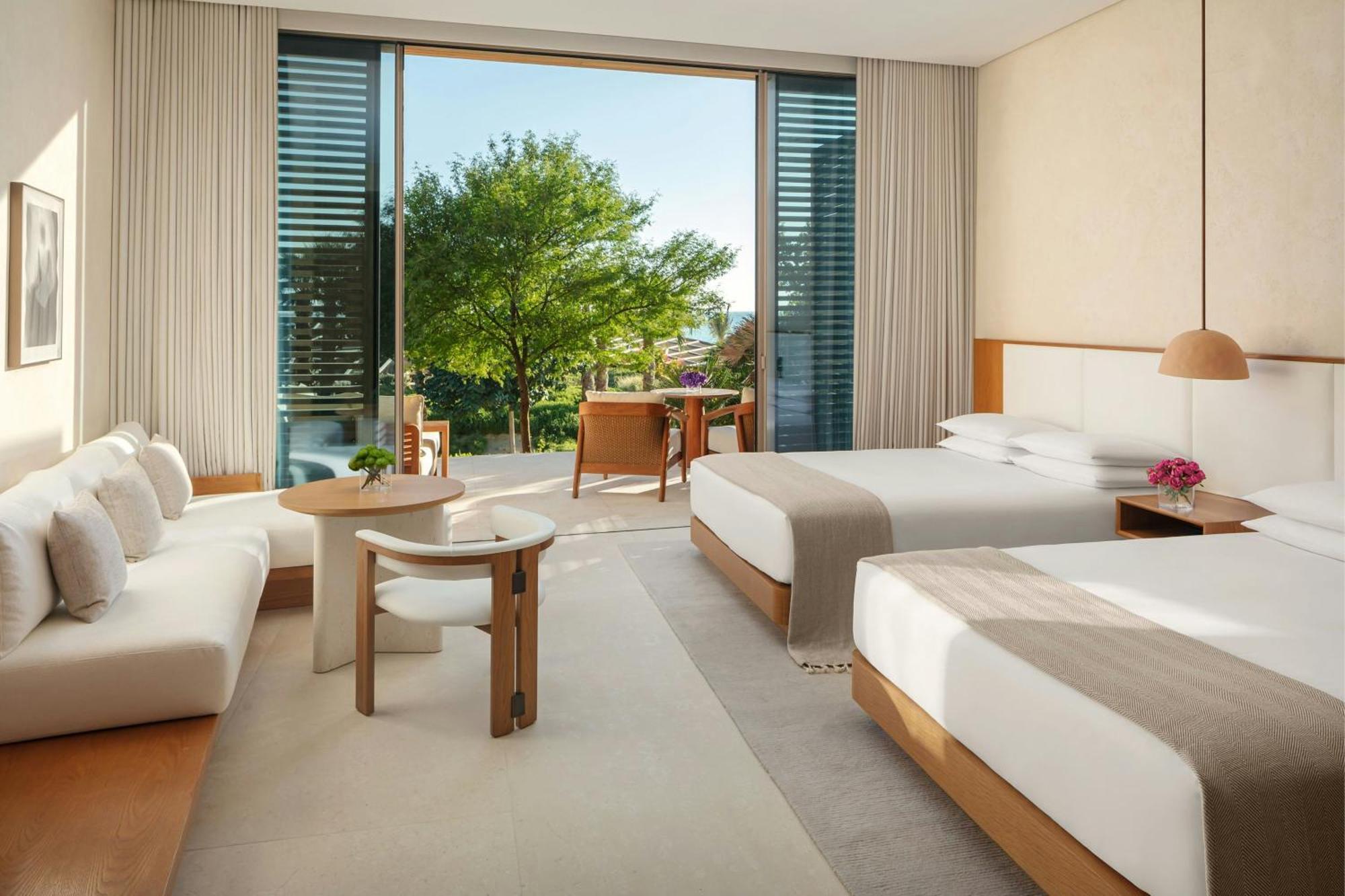Deluxe Queen Room with Two Queen Beds, Partial Sea View and Terrace