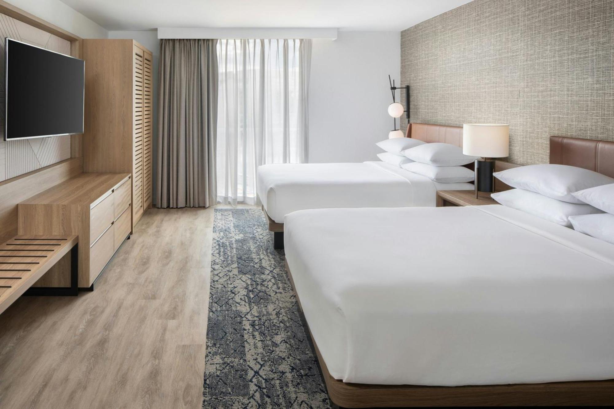 Suite met 2 Tweepersoonsbedden en Slaapbank
