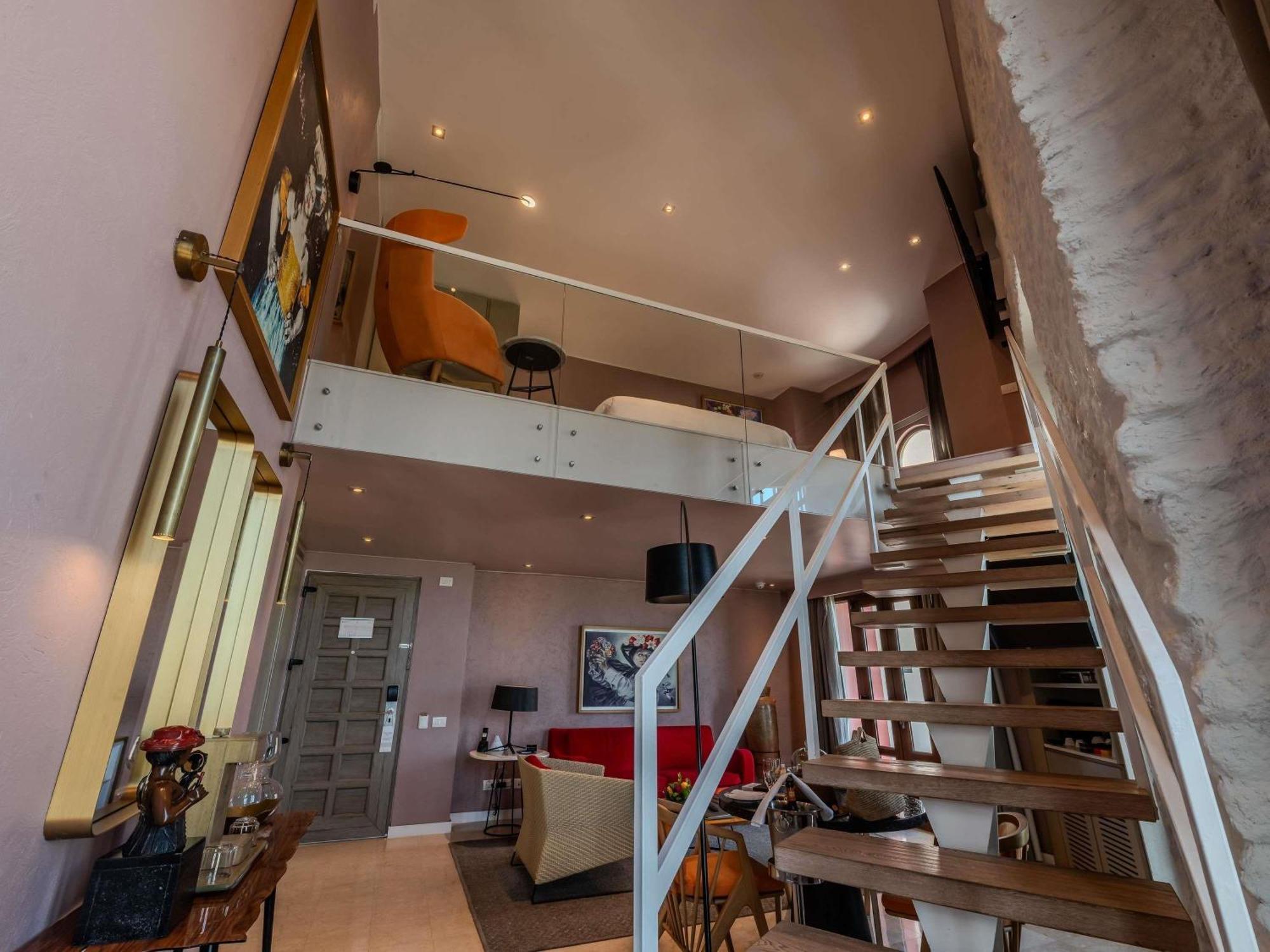 Grau Suite met Kingsize Bed - Terras - Uitzicht op Zee